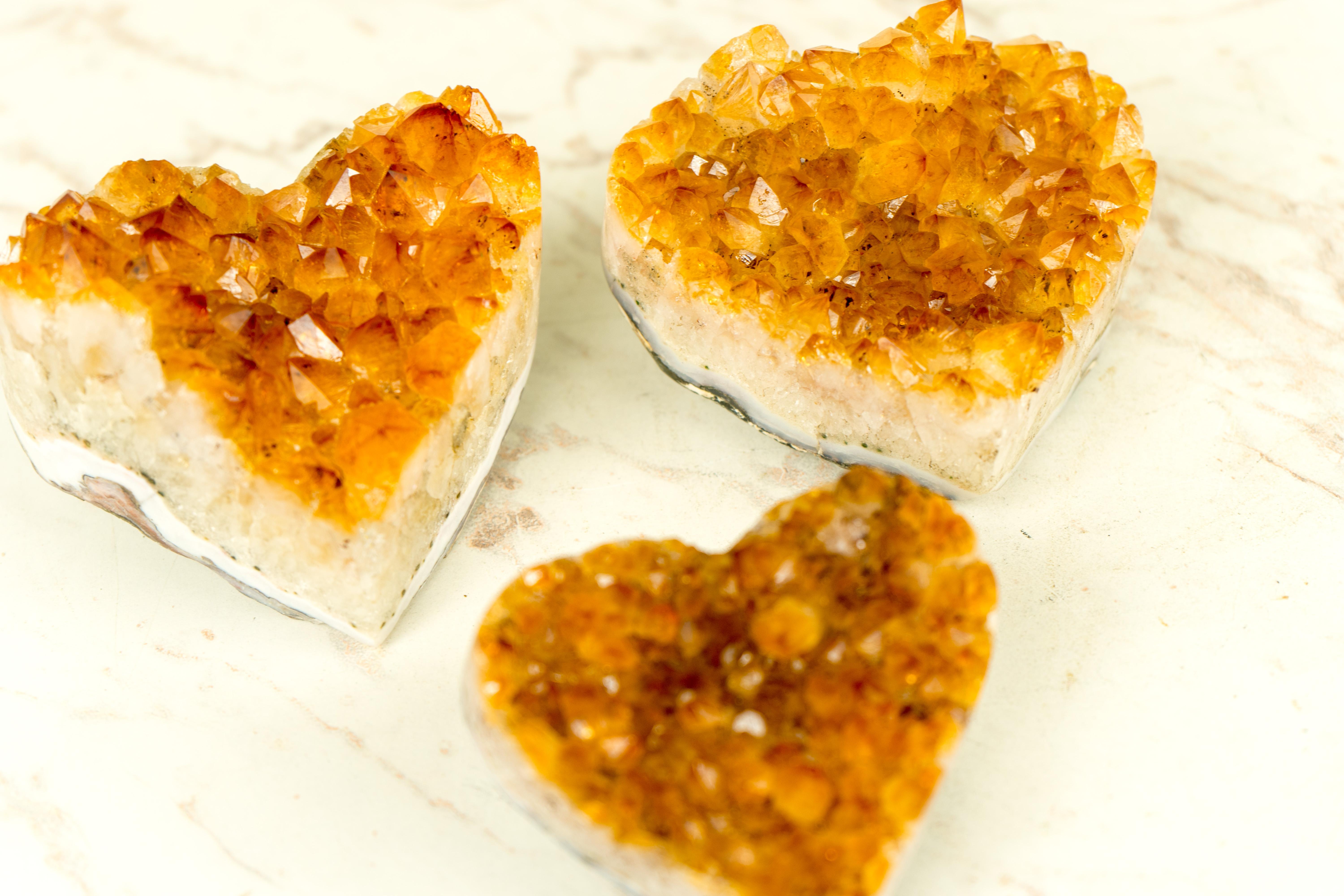 We have selected this set of Citrine Hearts based on their high quality, deep orange color, and overall beauty and luster. Each heart brings unique characteristics, including Goethite inclusions, perfect natural points, and more. These crystal
