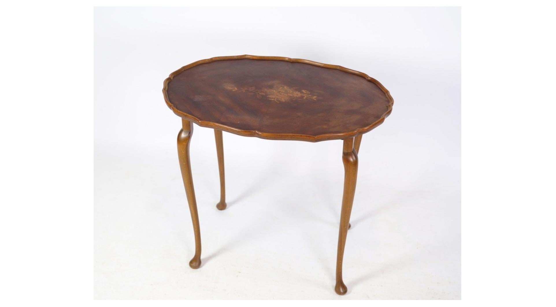 A captivating set of three insert tables adorned with neo-Rococo-style marquetry, dating back to the 1960s. These exquisite tables showcase the intricate craftsmanship and ornate design elements characteristic of the neo-Rococo period, adding a