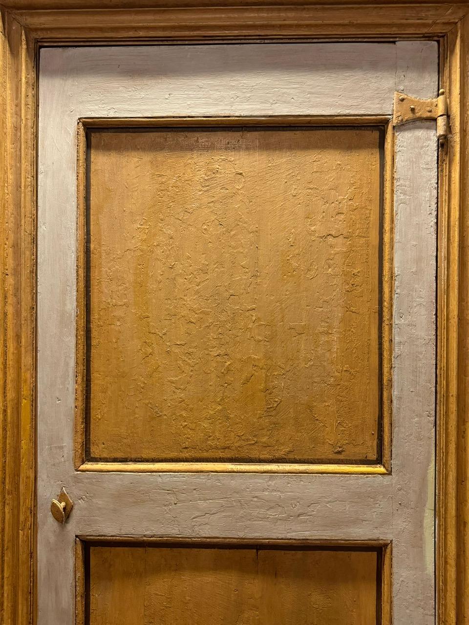 set of 3 antique interior doors, hand-built in solid lacquered wood in shades of beige/yellow, two-panel door, complete with original frame and gooseneck irons (crooked opening), originating in Italy, original from the 18th century. Pull opening to