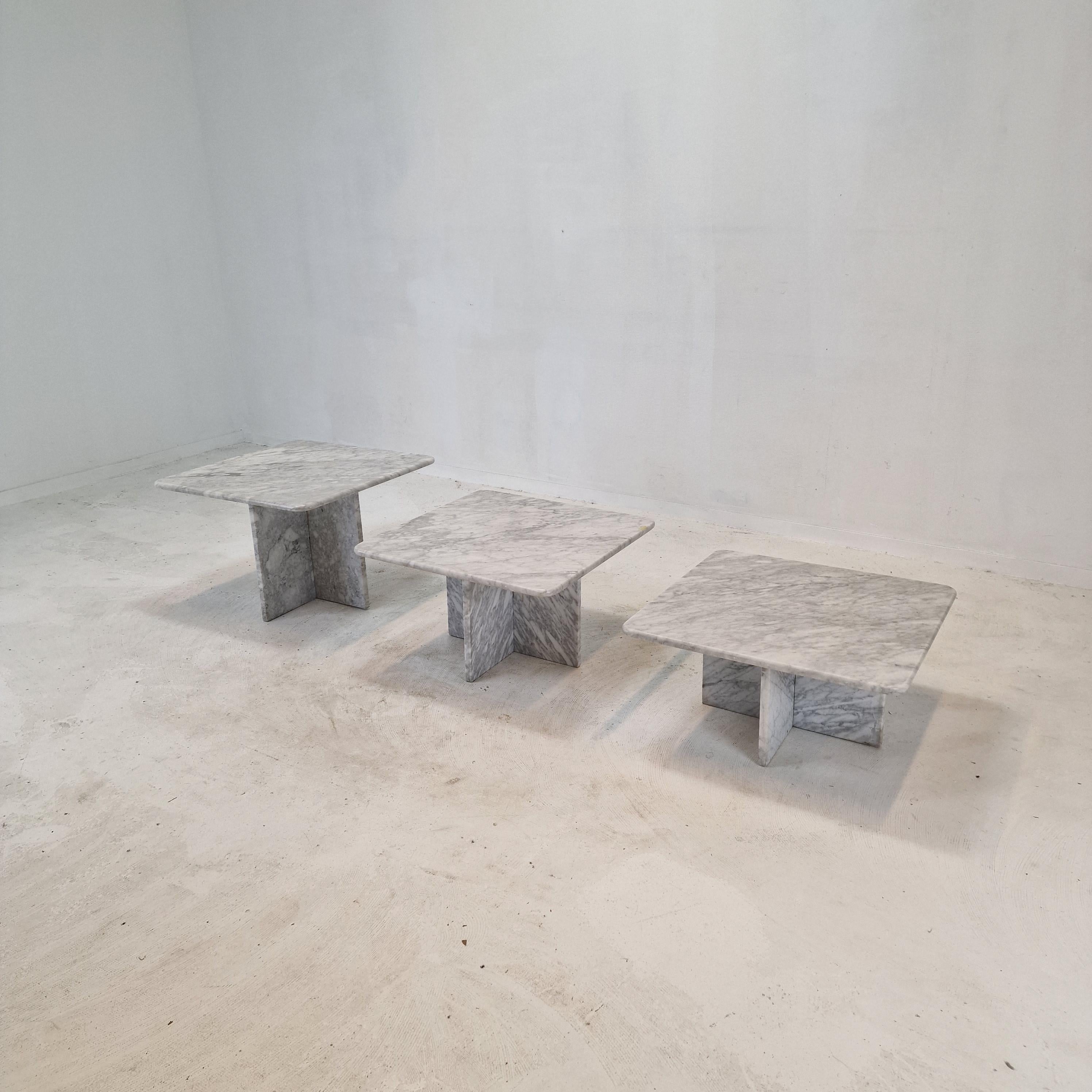 Stunning set of 3 Italian coffee or side tables, handcrafted out of marble. 
They can be used inside or outside the house.

The tables all have a different height so they fit under each other. 

The plate and the base are made of beautiful