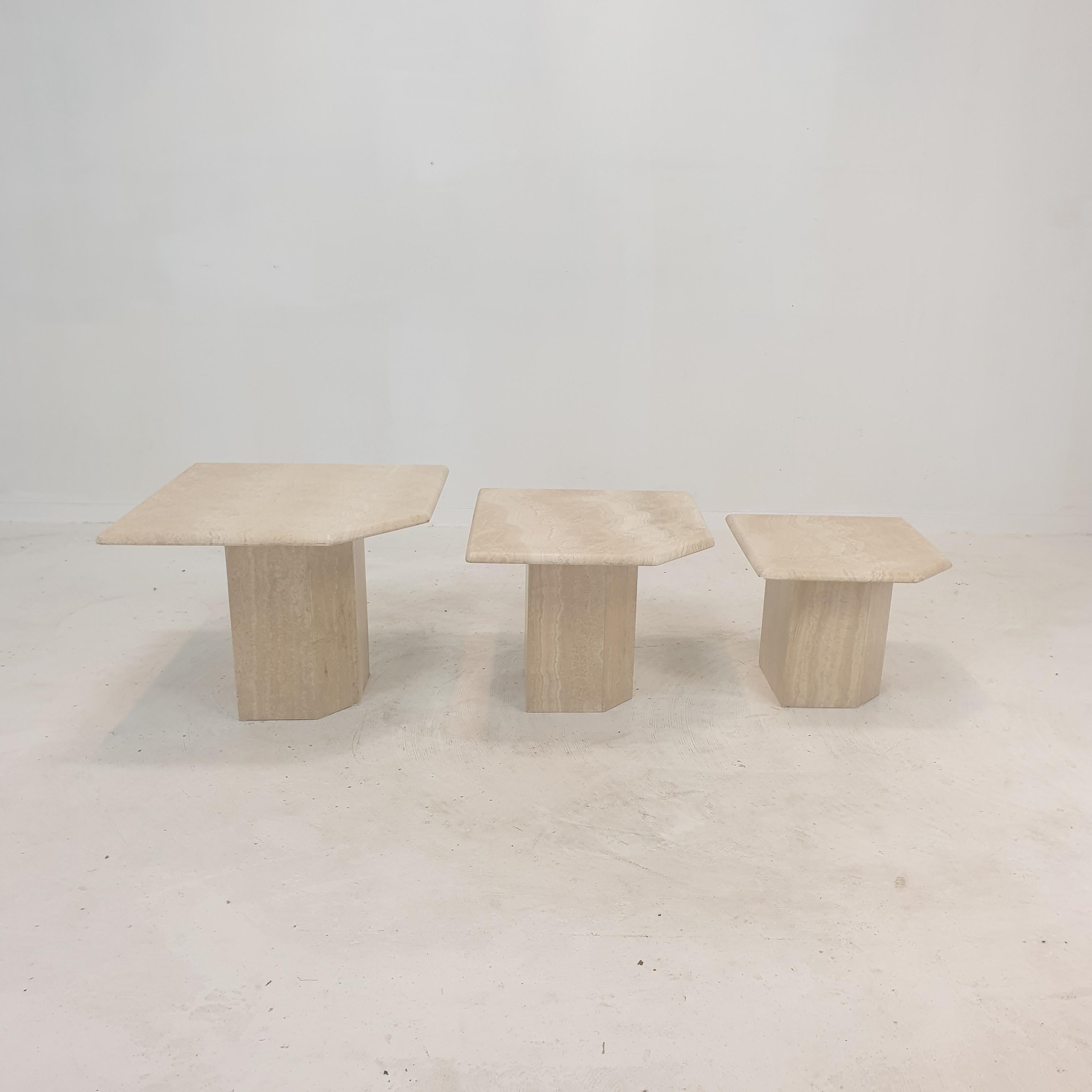 Stunning set of 3 Italian coffee or side tables, handcrafted out of marble. 
They can be used inside or outside the house.

The tables all have a different height so they fit under each other. 

The plate and the base are made of beautiful