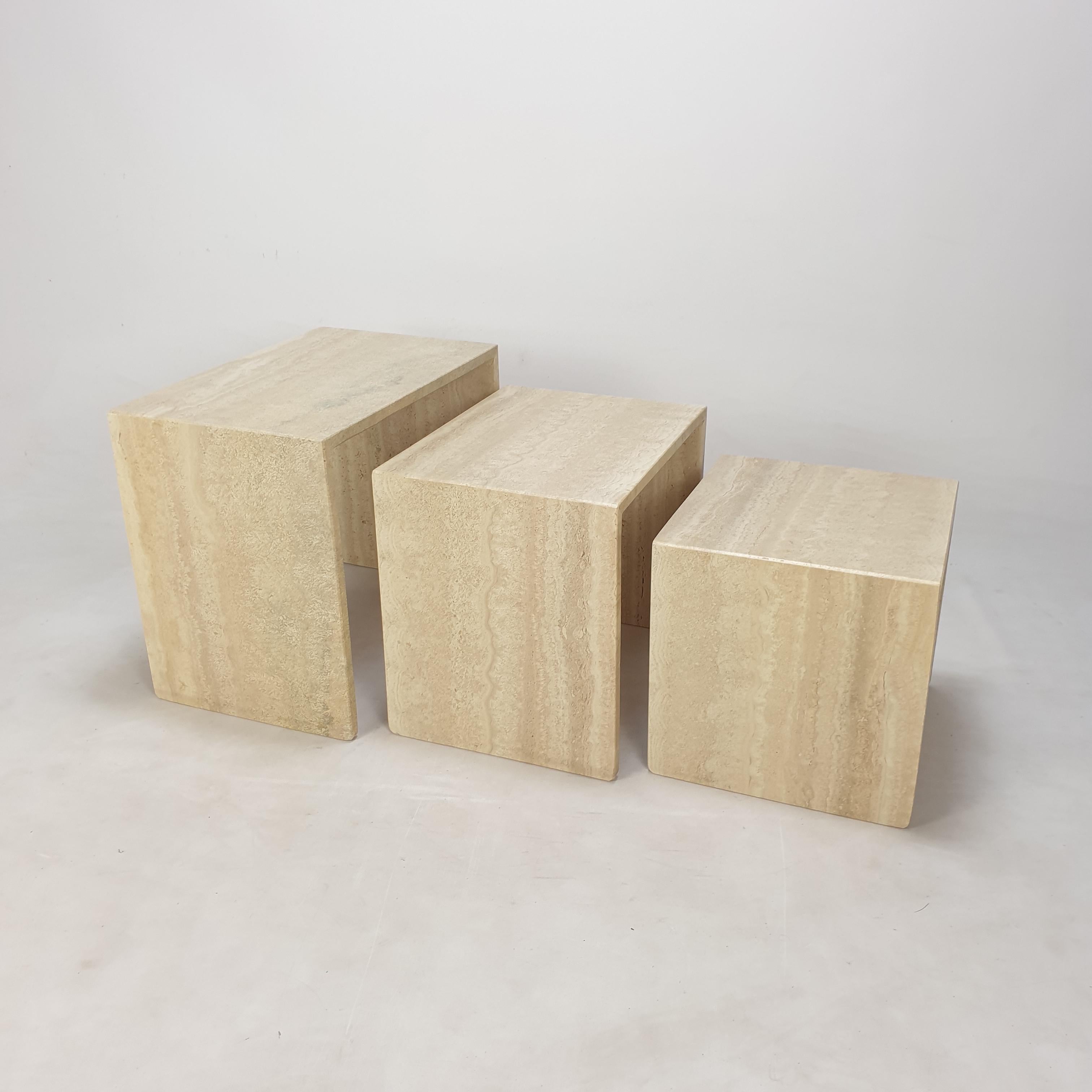 Very nice set of 3 Italian Coffee or Nesting Tables, handcrafted out of travertine. 

The tables have all a different size so they fit in each other.