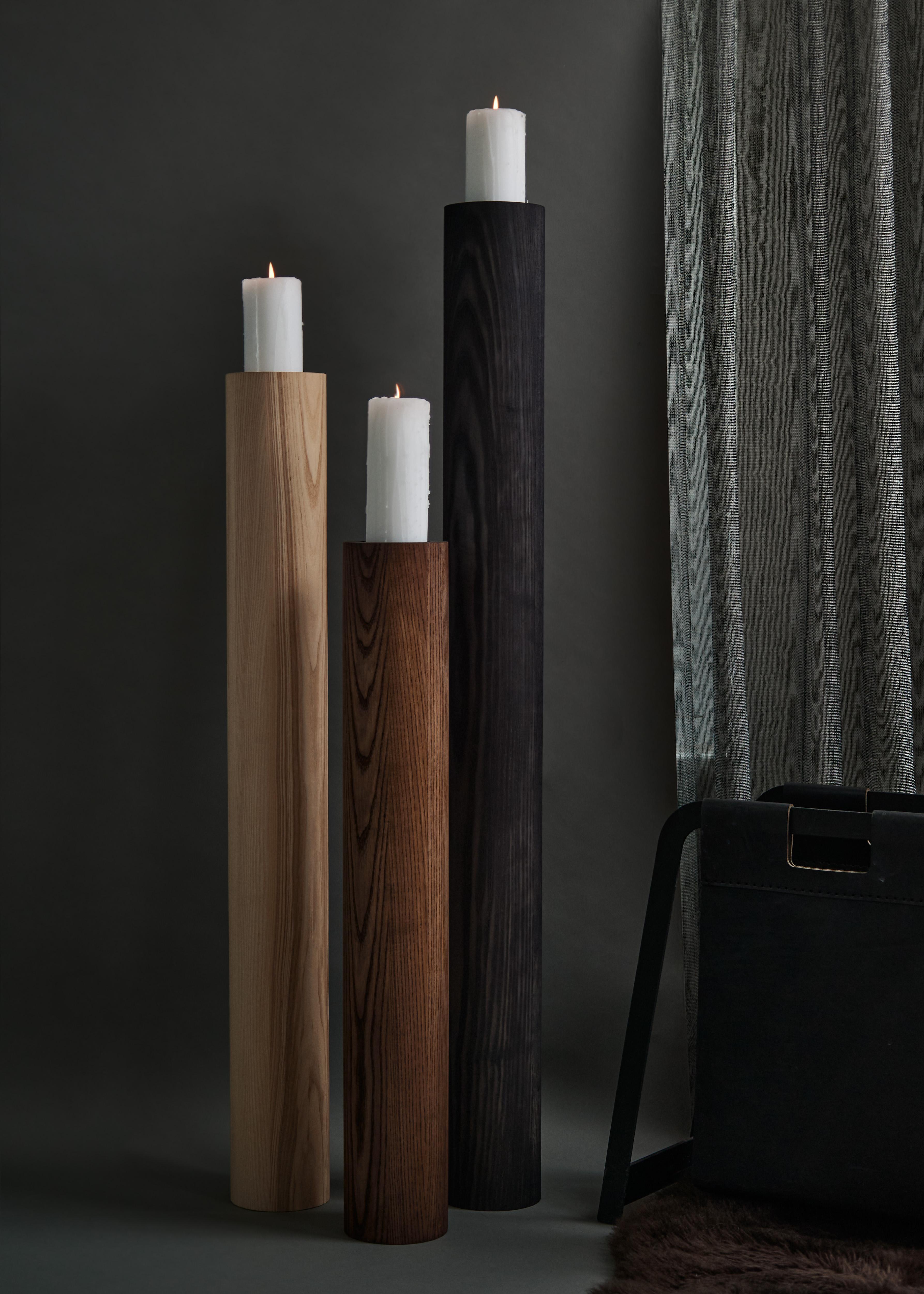 Set of 3 J D Candle Holders Timber by Nish Studio
Dimensions: D12 x H 79/ 98.7 /118 cm 
Materials: Ash, Timber satined natural light, chocolate + grey


N I S H is a Cape Town based Fashion and Furniture design studio. N I S H creates contemporary,