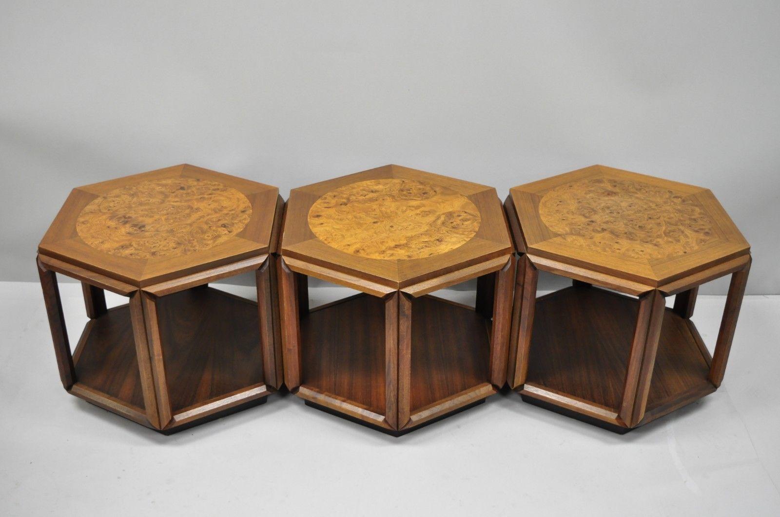 Set of 3 John Keal for Brown Saltman burl wood hexagon side tables. Listing includes, 3 side tables with nicely joined and angled corners, lower shelves, black platforms, beautiful wood grain, original label, and sleek sculptural form, circa