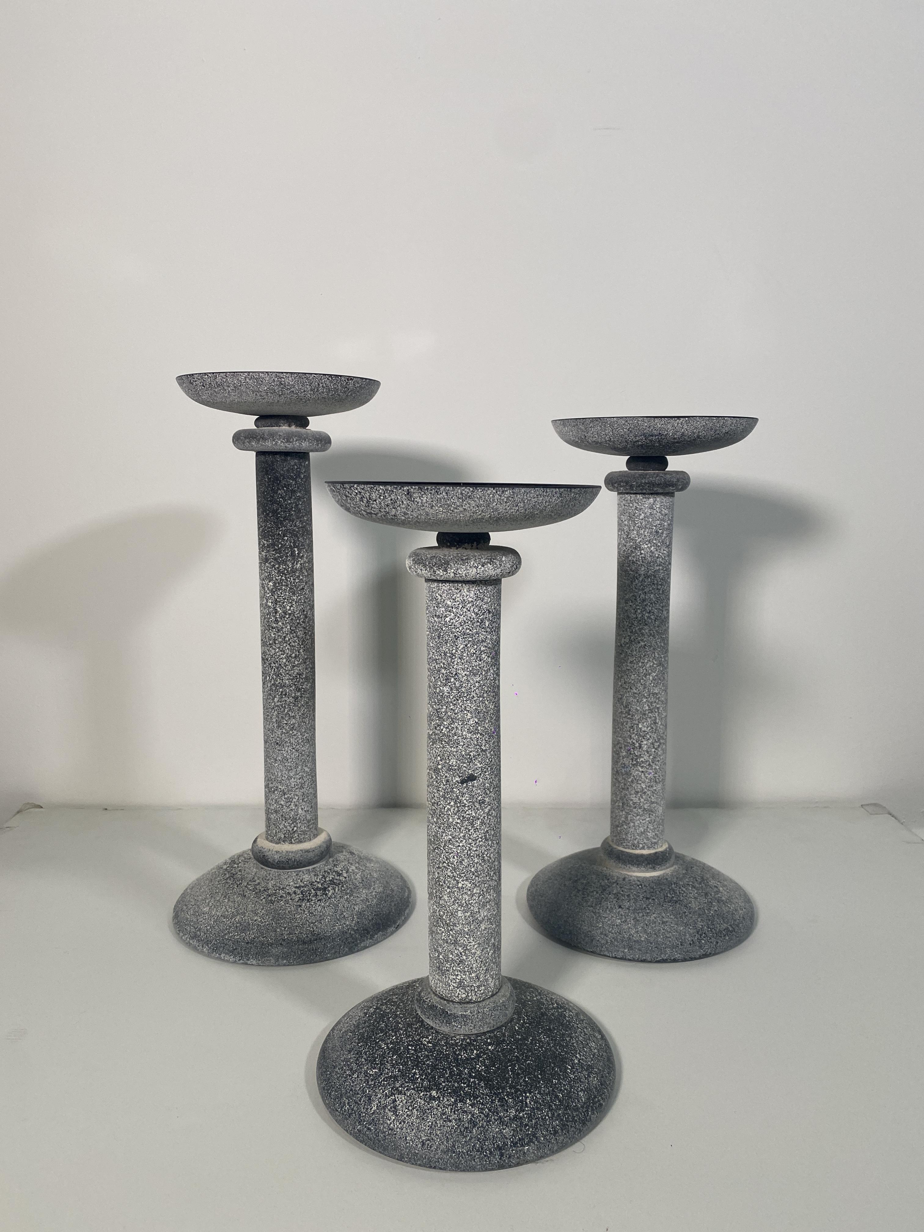 Set of three graduated candleholders, designed by Karl Springer. Made with the scavo technique (textured finish) this candlestick was handmade by the artisans at Seguso, circa 1980s
Candle holders measure: 
Measures: H: 18.24