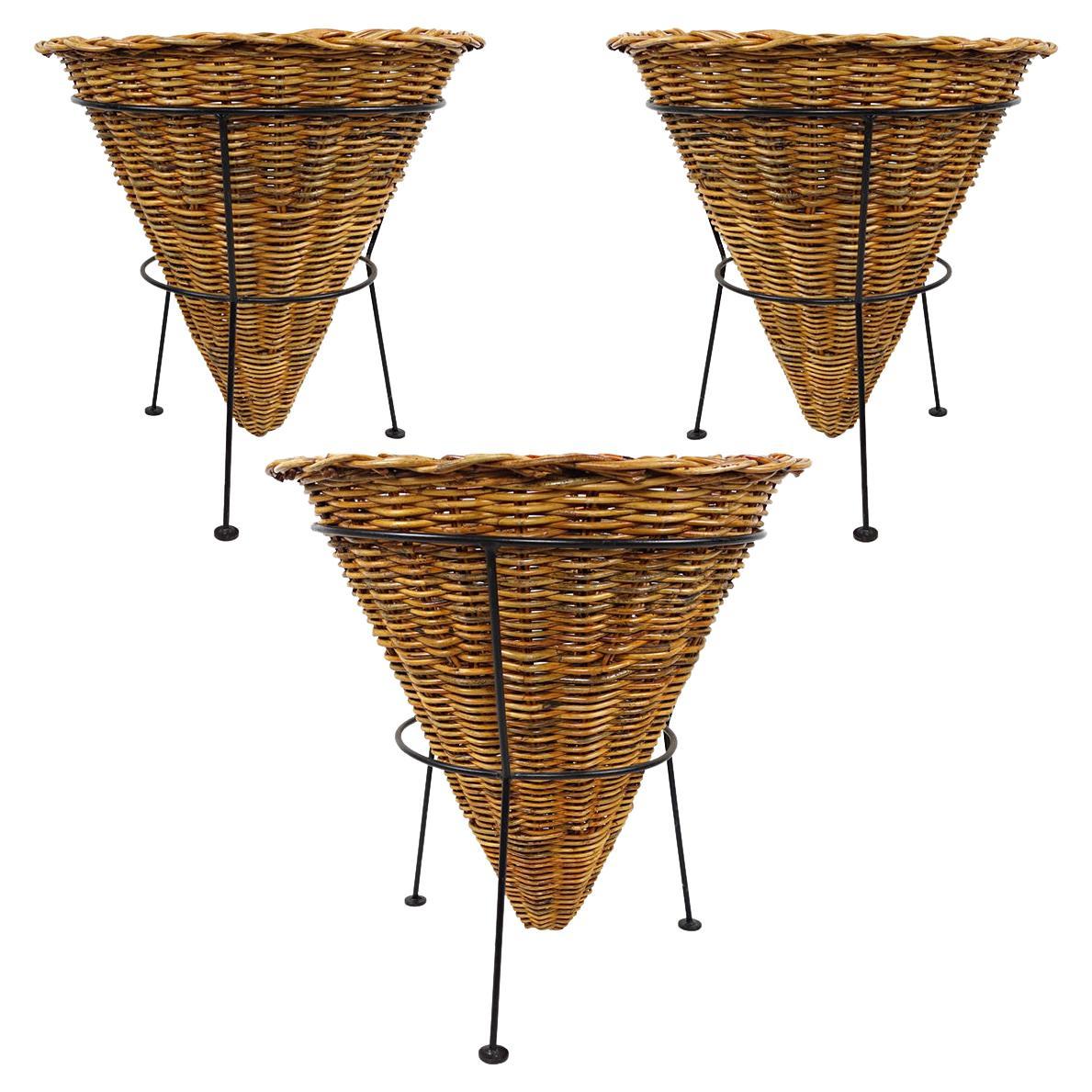 Set of 3 Large 1950s Wicker Baskets Sitting on a Black Metal Frame For Sale