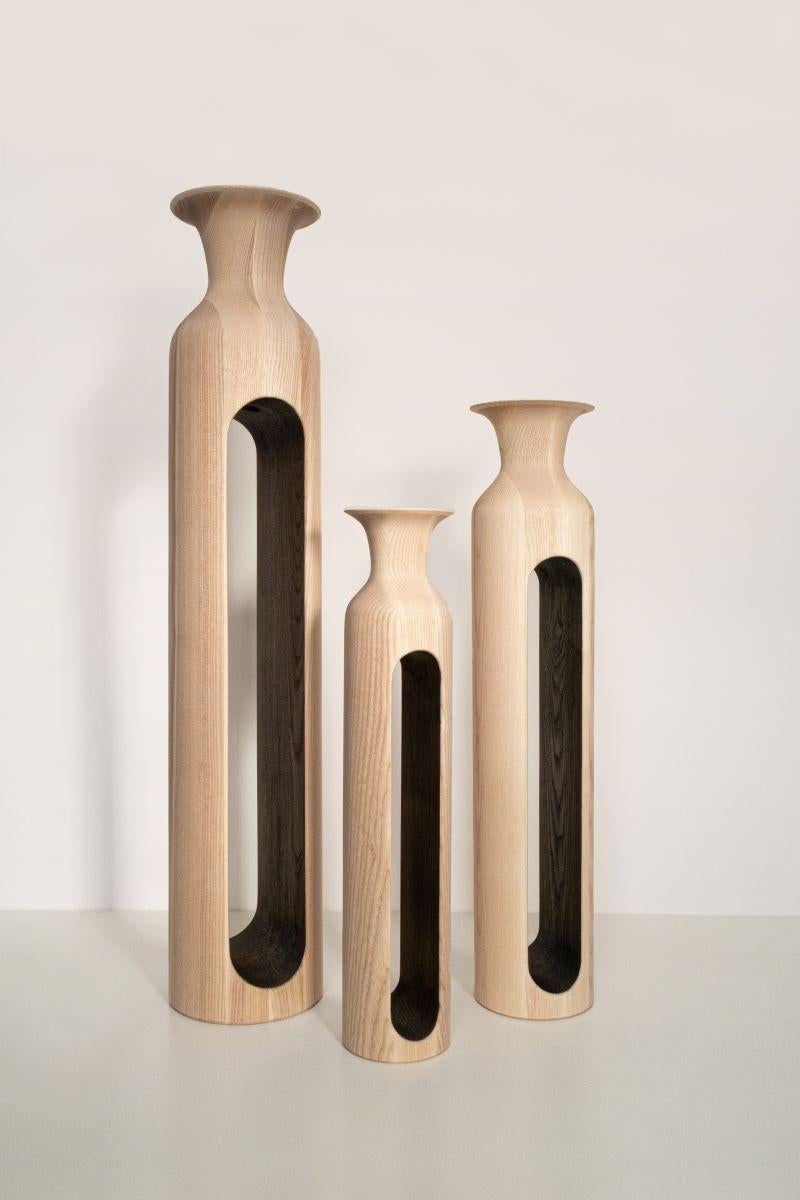 Set of 3 large ash bettoïa vases by Alexandre Labruyère 
Current Production
Dimensions: H 49 x D 10 cm / H 60 x D 12 cm / H 80 x D 15 cm
Materials: Ash, Black Coal Wax, Natural Oil Protection.
Also Available: Oak, Sycamore, Red Oak,

All