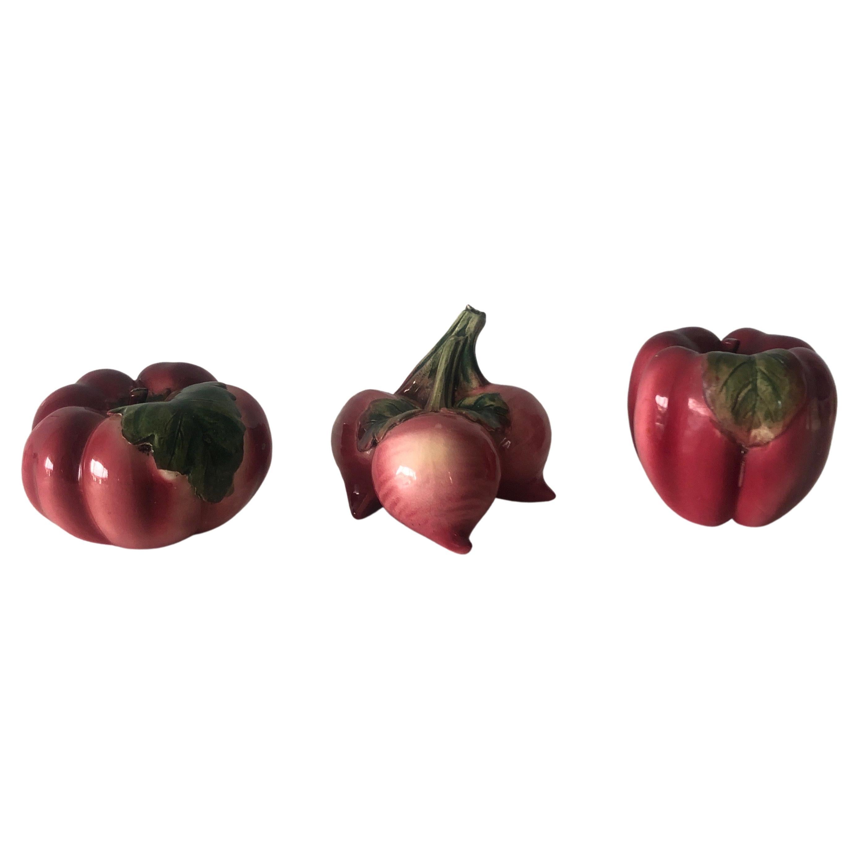 Set of (3) large red and green handcrafted ceramic decorative vegetables.
Ideal for a tray or on display at a kitchen counter or display cabinet.
Very realistic pottery.
-Tomato: 4.5 x 3
-Pepper: 3.5 x 3
-Radishes: 4.4 x 4.
