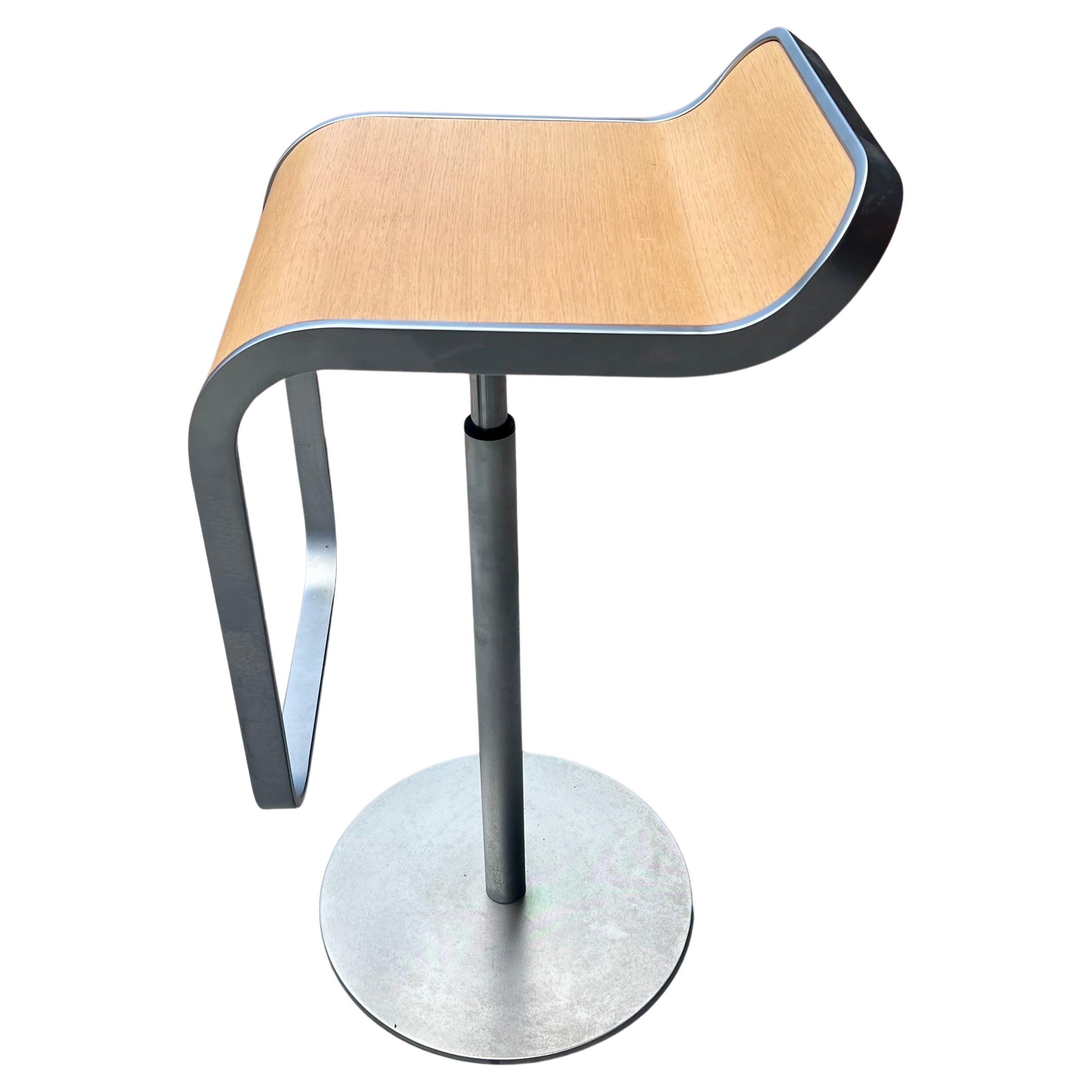 Manufactured in Italy, based on the original designs by Shin & Tomoko Azumi for La Palma, set of 3 Lem Piston Barstools feature curved oak and brushed chrome base and frame, with an adjustable height. Very good condition, consistent with age and