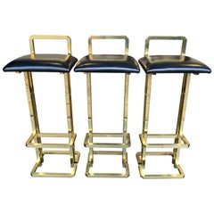 Set of 3 Maison Jansen Style Gilt Metal Stools with Black Leather Seat Pads