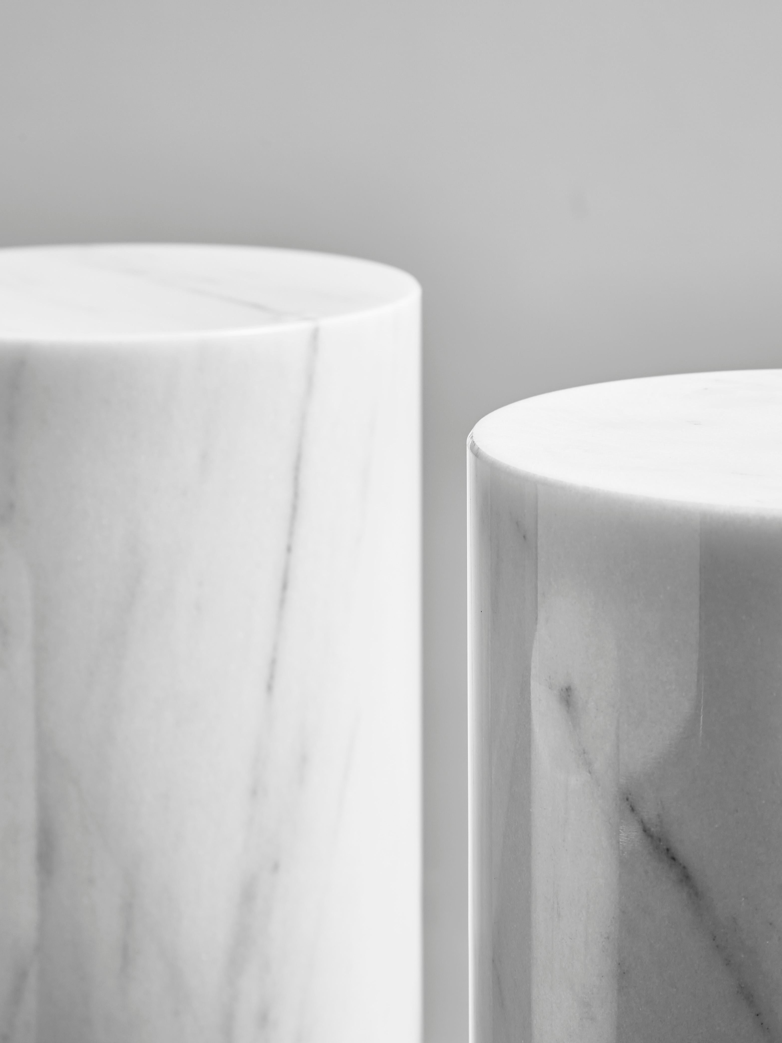 Elegant set of 3 pedestals in massive white marble from Carrara.
Creation by Studio Glustin.
France, 2017.
Dimensions: 
2 pedestals at ø 20 x H 58 cm
1 pedestal at ø 30 x H 43 cm.
