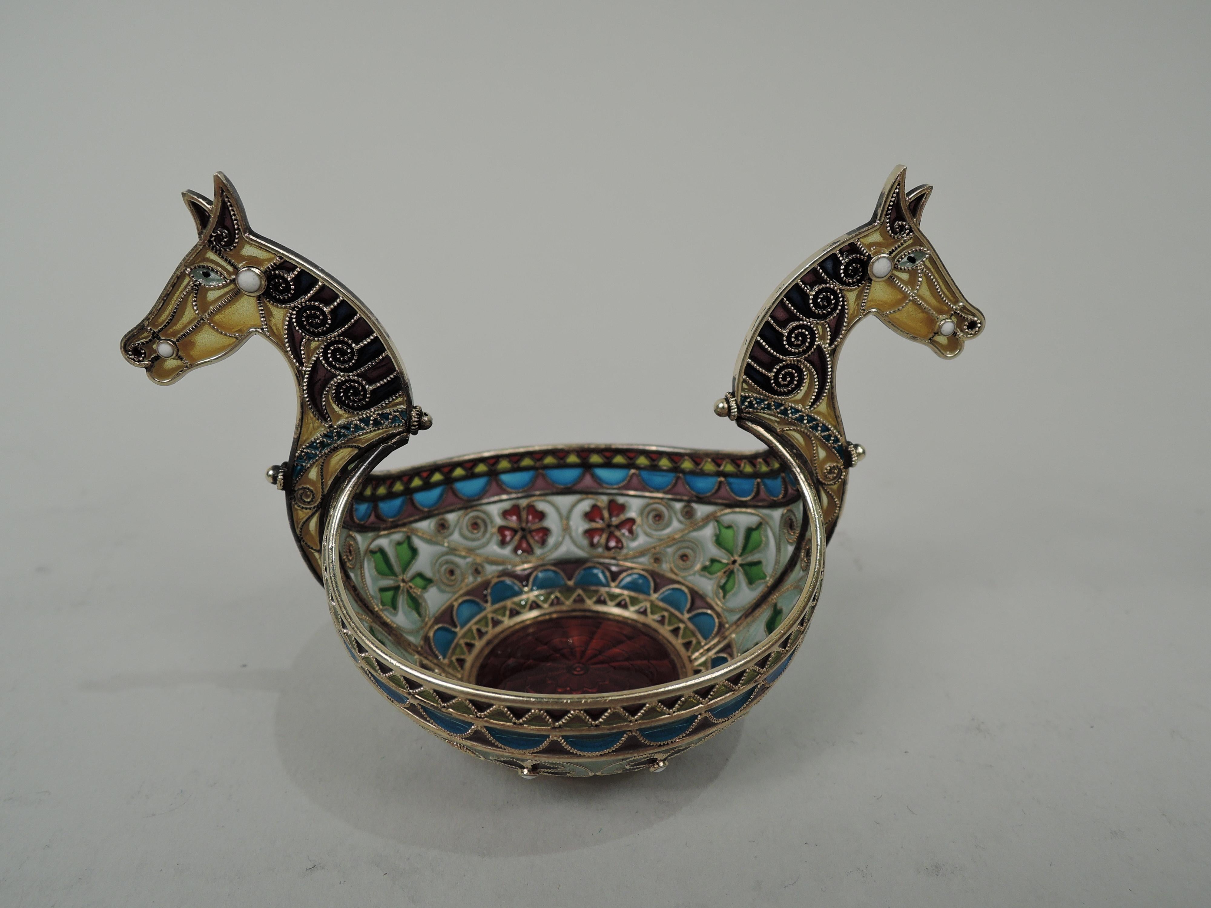 Set of 3 plique à jour enamel and gilt 930 silver open salts. Made by Marius Hammer in Norway, ca 1910. Each: Round with curved sides. Well guilloche enamel (two red, one blue). Horse bust side handles. Bands of stylized plant and geometric