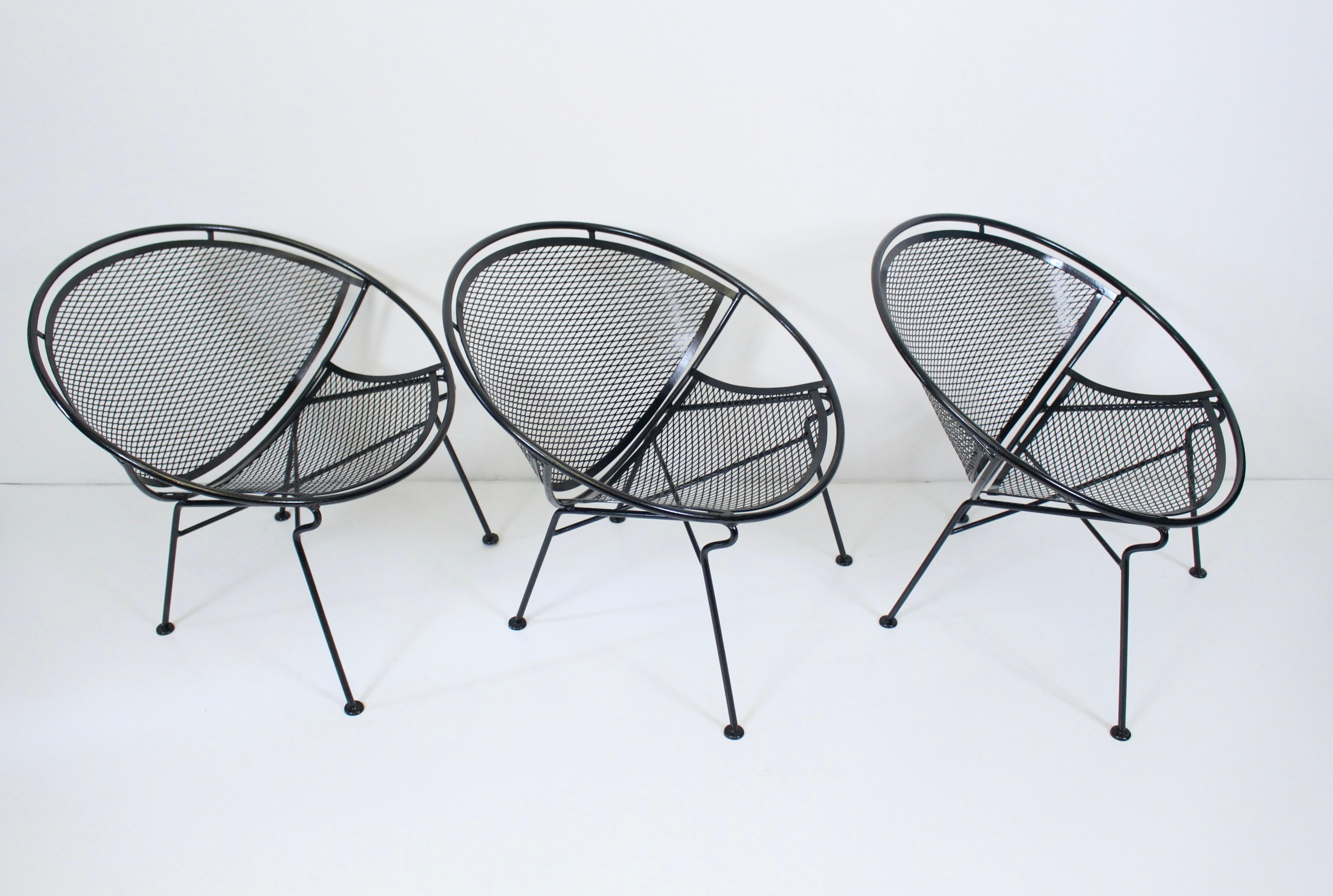 Original set of three black Radar Collection patio, poolside lounge chairs designed by Maurizio Tempestini for John Salterini, 1950's. Featuring smooth, sturdy, ergonomic wrought iron hoop construction with expanded iron wire seat and back. Detailed