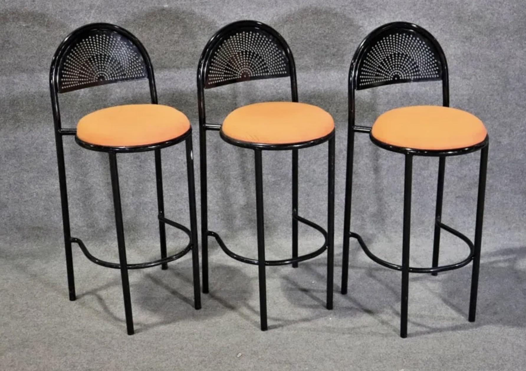 6 Available
Listing is for 3 black painted metal stools with bright orange seats.
Half round perforated seat back.
Please confirm location NY or NJ