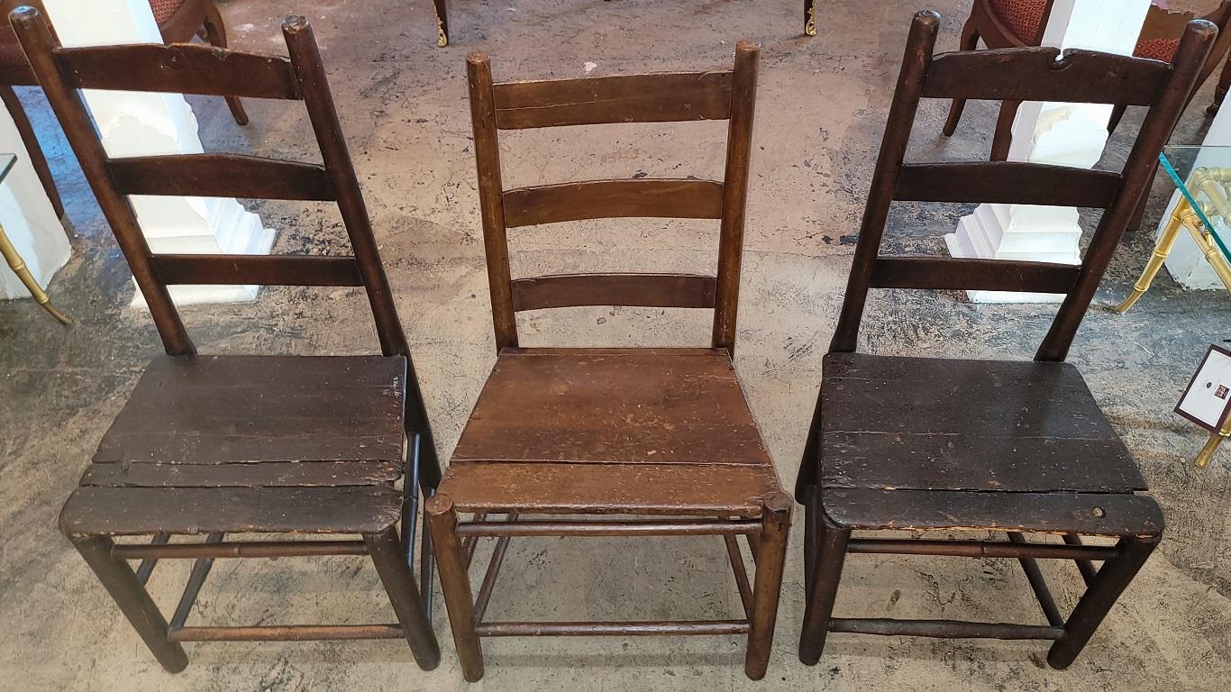 PRESENTING 3 GLORIOUS pieces of AMERICAN WESTERN HISTORY !

This is a Set of 3 Mid 19C Shaker Pioneer Ladderback Chairs from circa 1840-60.

The set of 3 ladderback side chairs are not identical or matching. This is not unusual, as each were fully