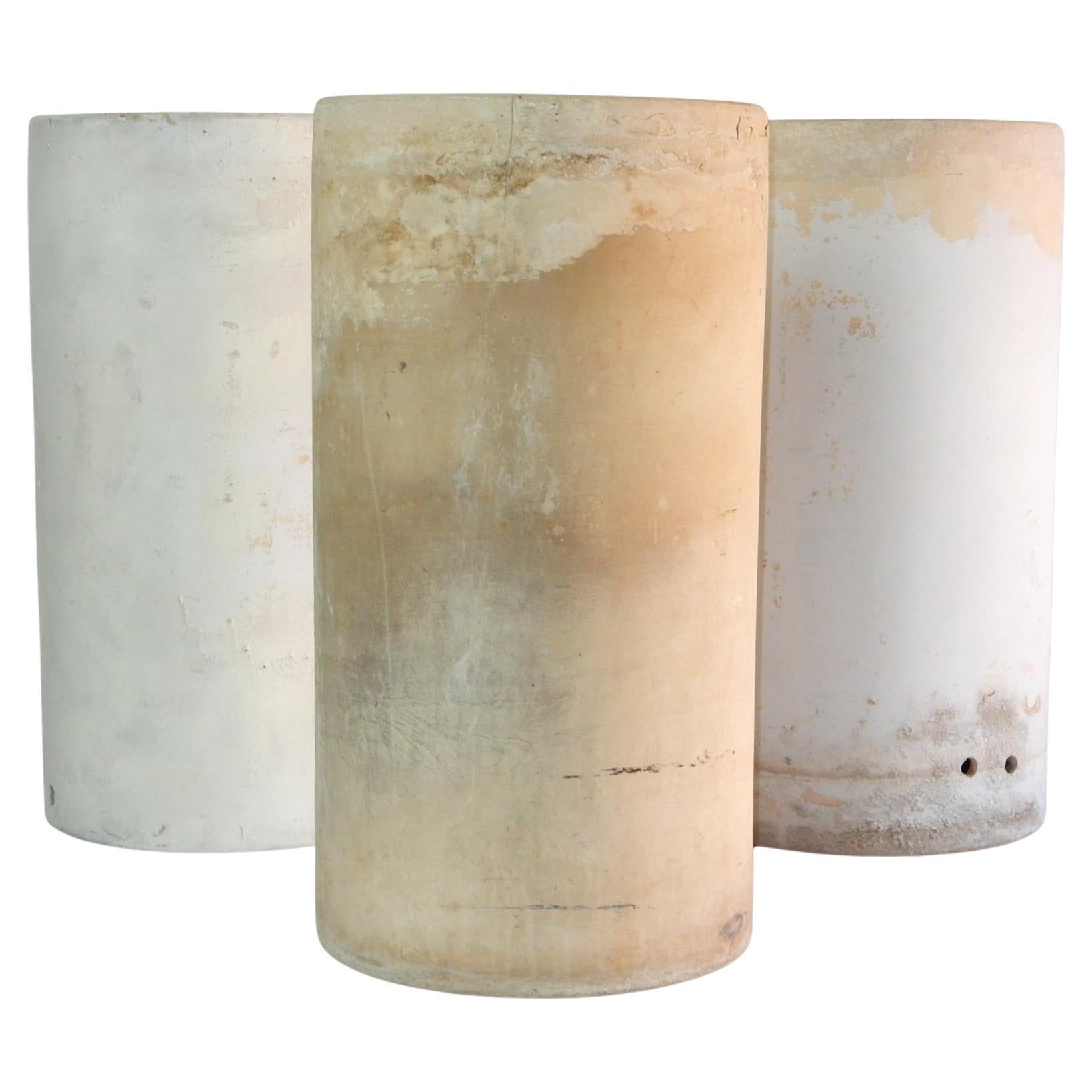 Set of 3 large ceramic bisque planters or sand pots from the 1950's
in the style of Willy Guhl.
3 available.
Perfect amount of patina only 60 years can bring.
Some cracks and minor chips.
 