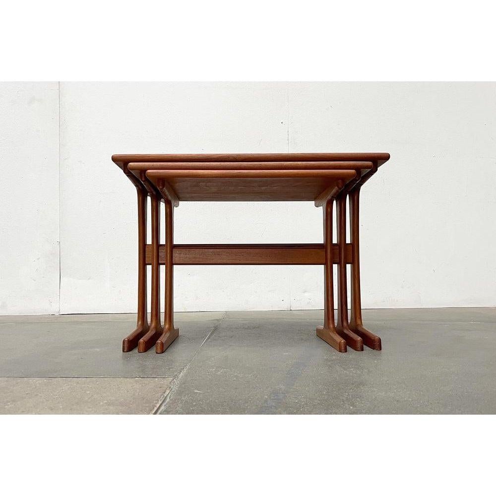 Classic teak nesting tables from Vildbjerg Møbelfabrik. The design is usually attributed to Kai Kristiansen.What is striking about this … Read more Classic teak nesting tables from Vildbjerg Møbelfabrik. The design is usually attributed to Kai