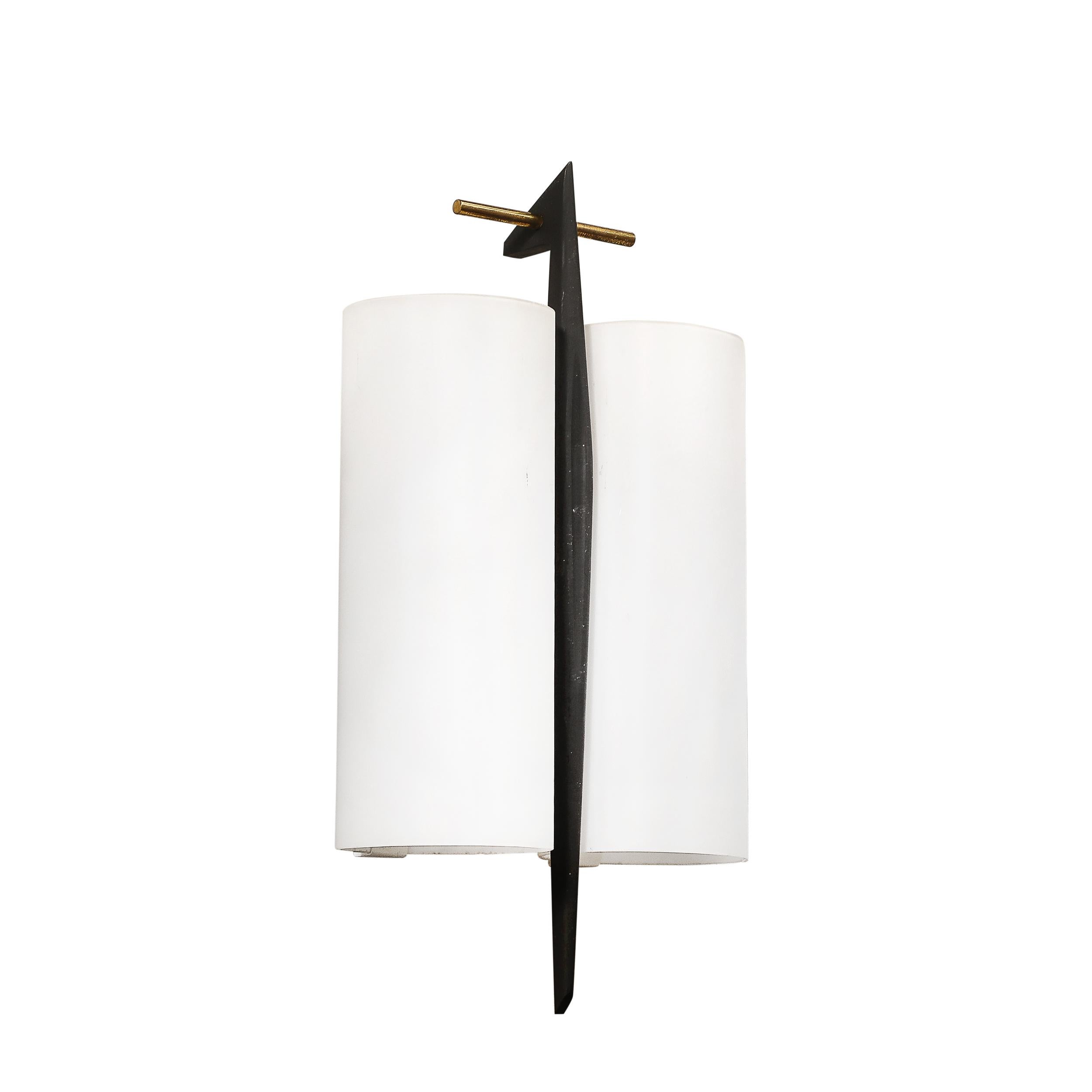 This elegant set of three mid-century modernist sconces was created by the esteemed French design house Maison Arlus around 1950. The sconces feature a harmonious combination of frosted glass, brass, and black enamel, embodying the sleek and
