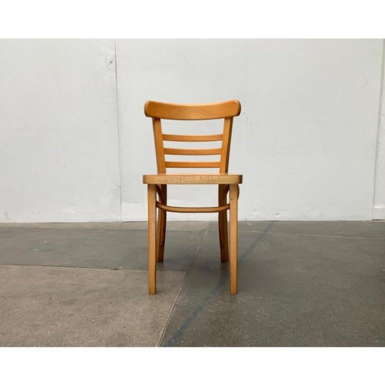 Classic wooden chairs with bowwood elements from the polish manufacturer zpm radomsko, a former thonet company. These chairs were made for mobilair.

a classic design. The backrest is concave. The legs are broken down via the bow element below the