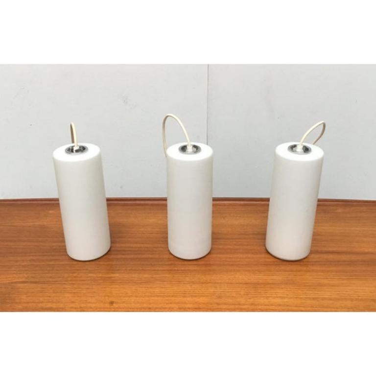 Mid-Century moderno Set di 3 lampade a sospensione in vetro tedesco di metà secolo da Limburg, anni '60 in vendita