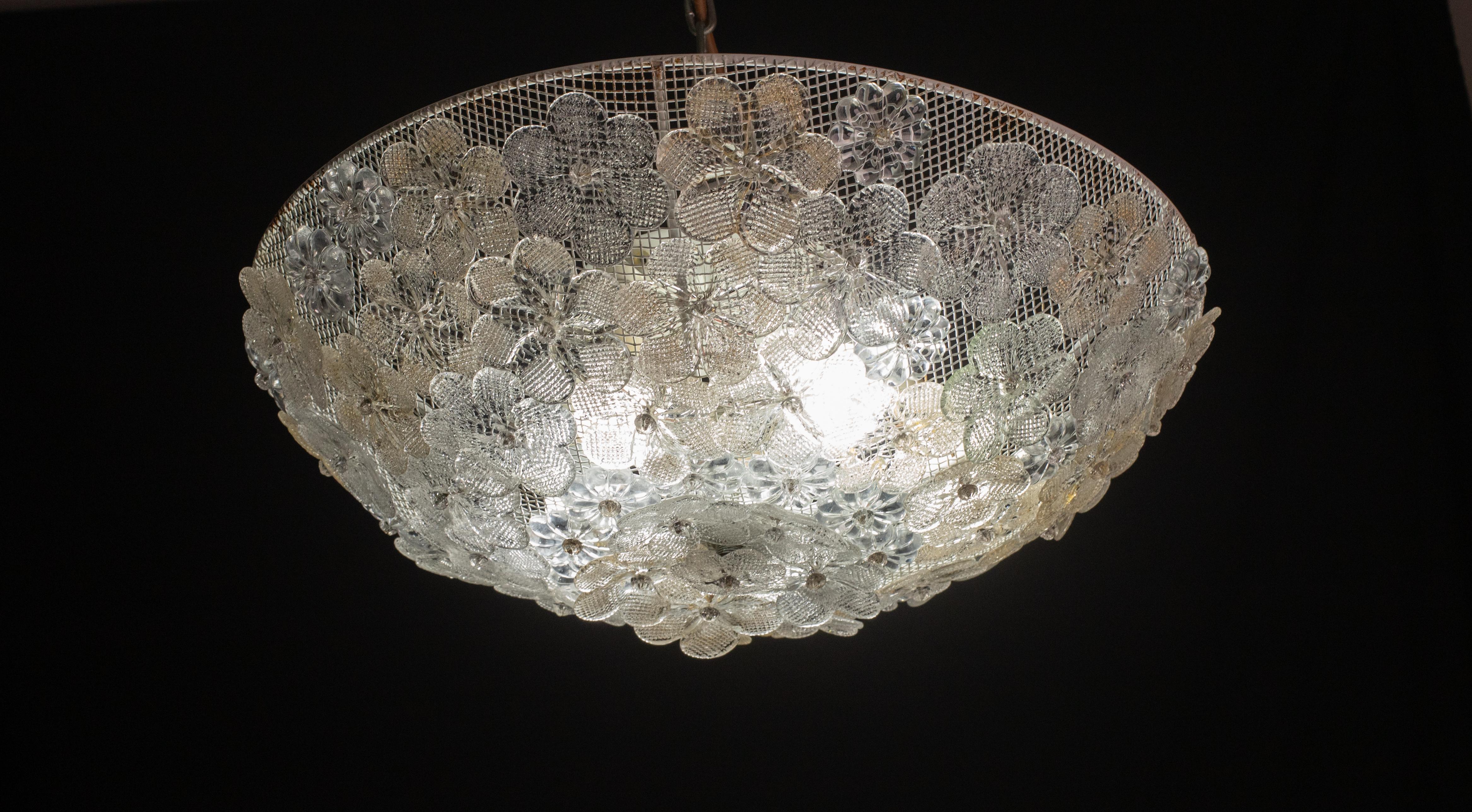 Fantastic set of 3 Light: 2 wall light and one Ceiling Light.

Ceiling Light:

This amazing flower basket is made of dozen of precious Murano flowers glasses.
Available a pair of extraordinary sconces.
5 E 14 light bulbs, possible to rewire for