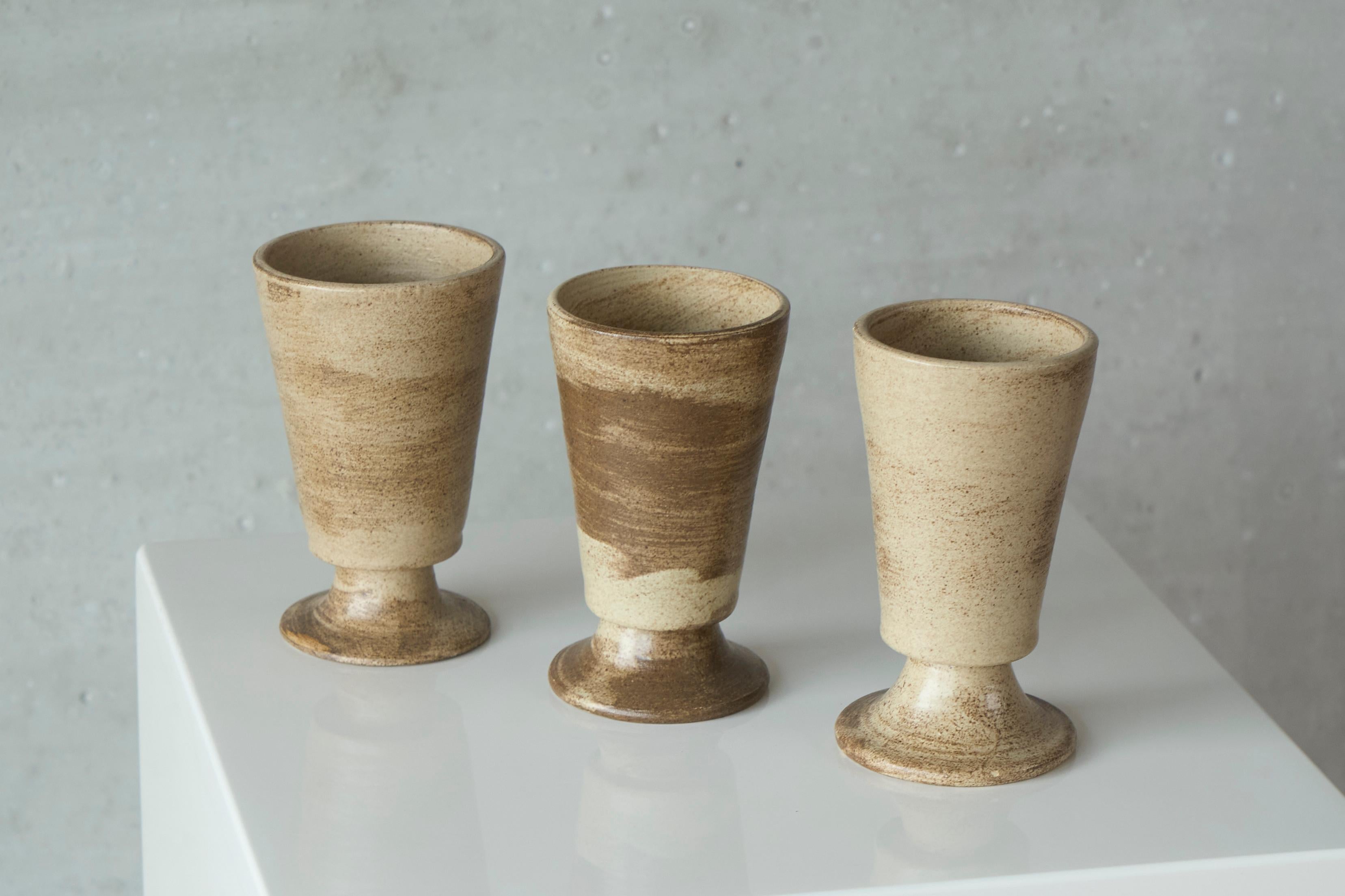 Set of 3 Mid Century Grès Pottery Goblets 1960s.

Wonderful set of 3 mid century studio pottery goblets from France. Nice color and expressive grain in the pottery. Distinct hand made quality - very nice display items, but can also be used. 

These