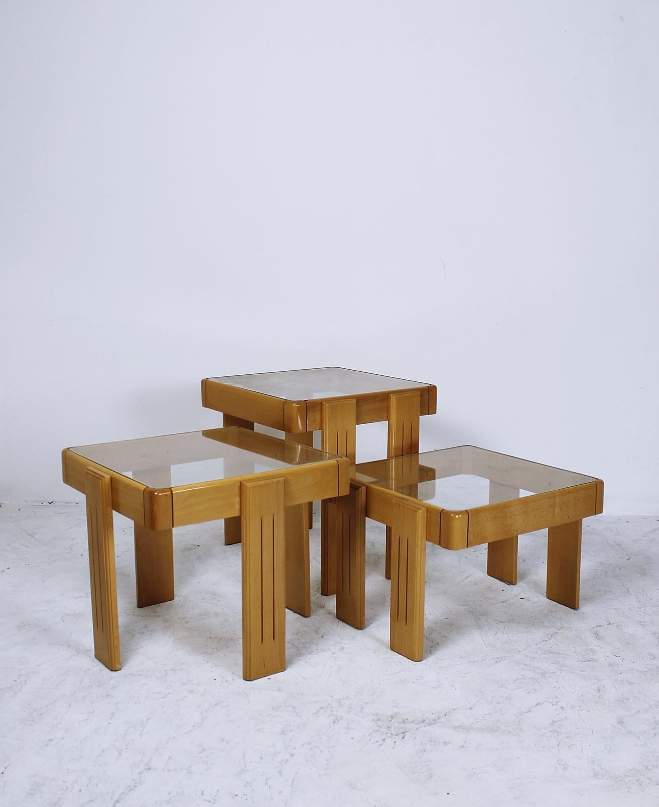 Modern set of 3 nesting, stacking, side or end tables
Material: wood (maple), glass
Age: vintage, midcentury
Origin: Yugoslavia
Condition: good, age related wear
Dimensions: 51 x 48 x 48 cm 42 x 48 x 48cm 31 x 48 x 48cm.