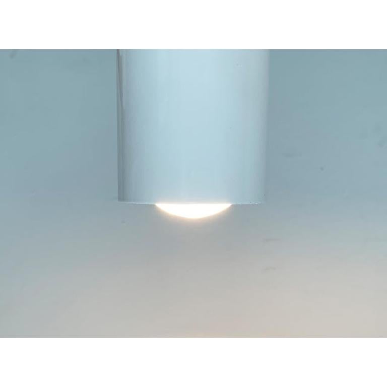 Minimalist ceiling lights in tube form.

A simple and functional design. The luminaire body consists of a simple metal tube that is open below. Inside there is a normal E27 version. Up to 250V (Europe/UK Standard). The wiring of this item may be