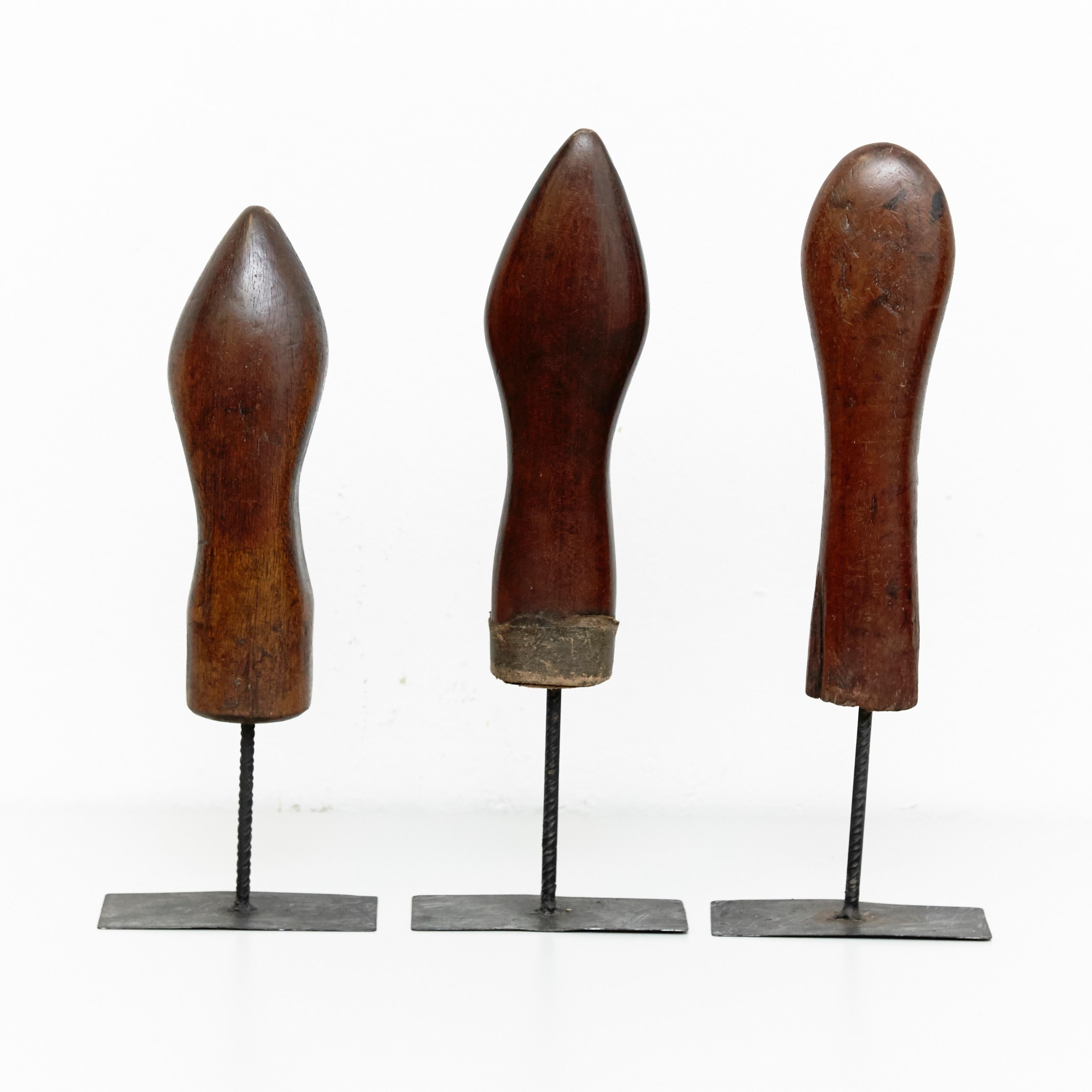 Set of 3 Mid-Century Modern wood and metal sculptures, circa 1950
By Unknown artist, manufactured in Spain, circa 1950.

In original condition with minor wear consistent of age and use, preserving a beautiful patina.

Beautiful artworks, very