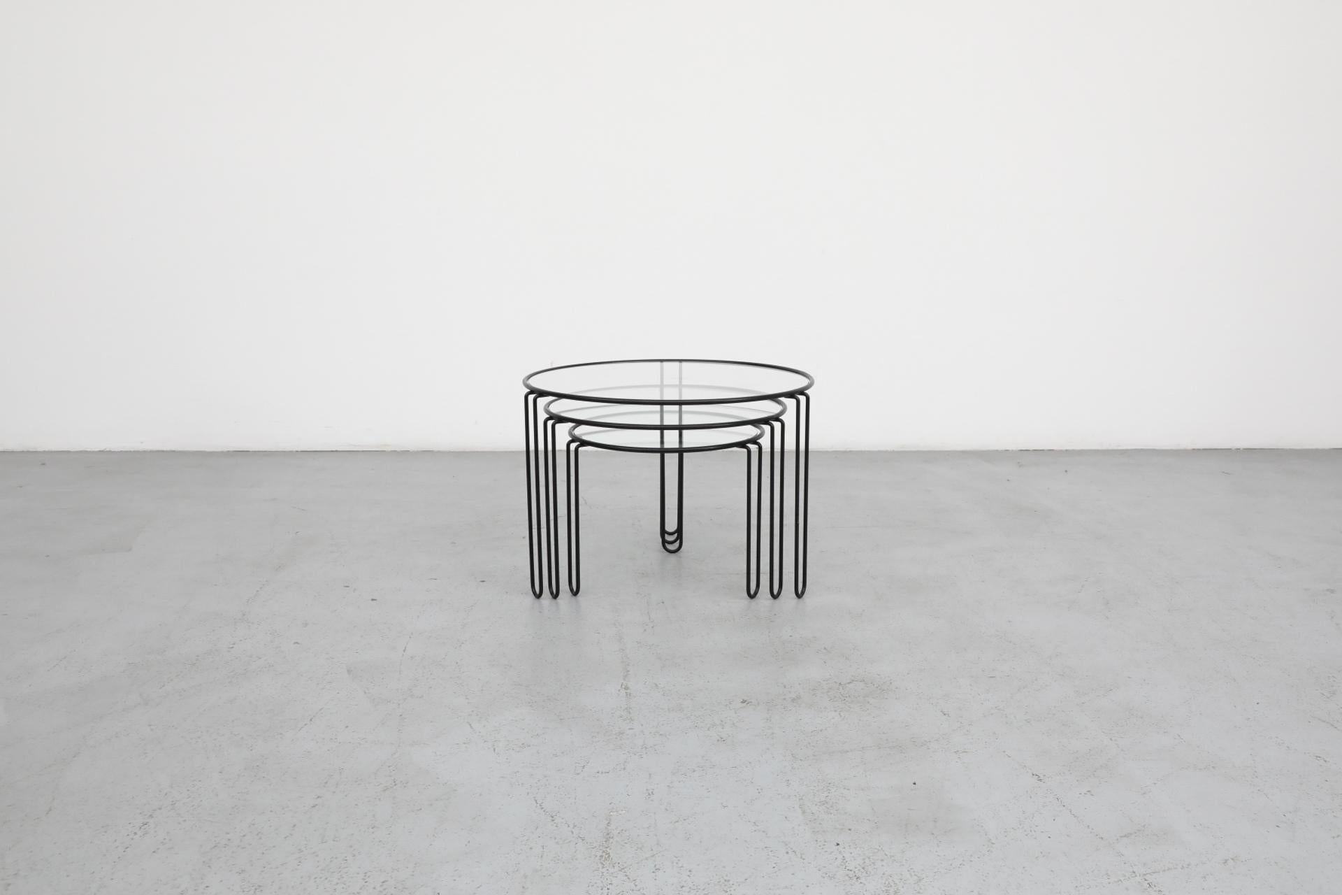 Enameled Set of 3 Mid-Century Modernist Wire Frame and Glass Top Nesting Tables