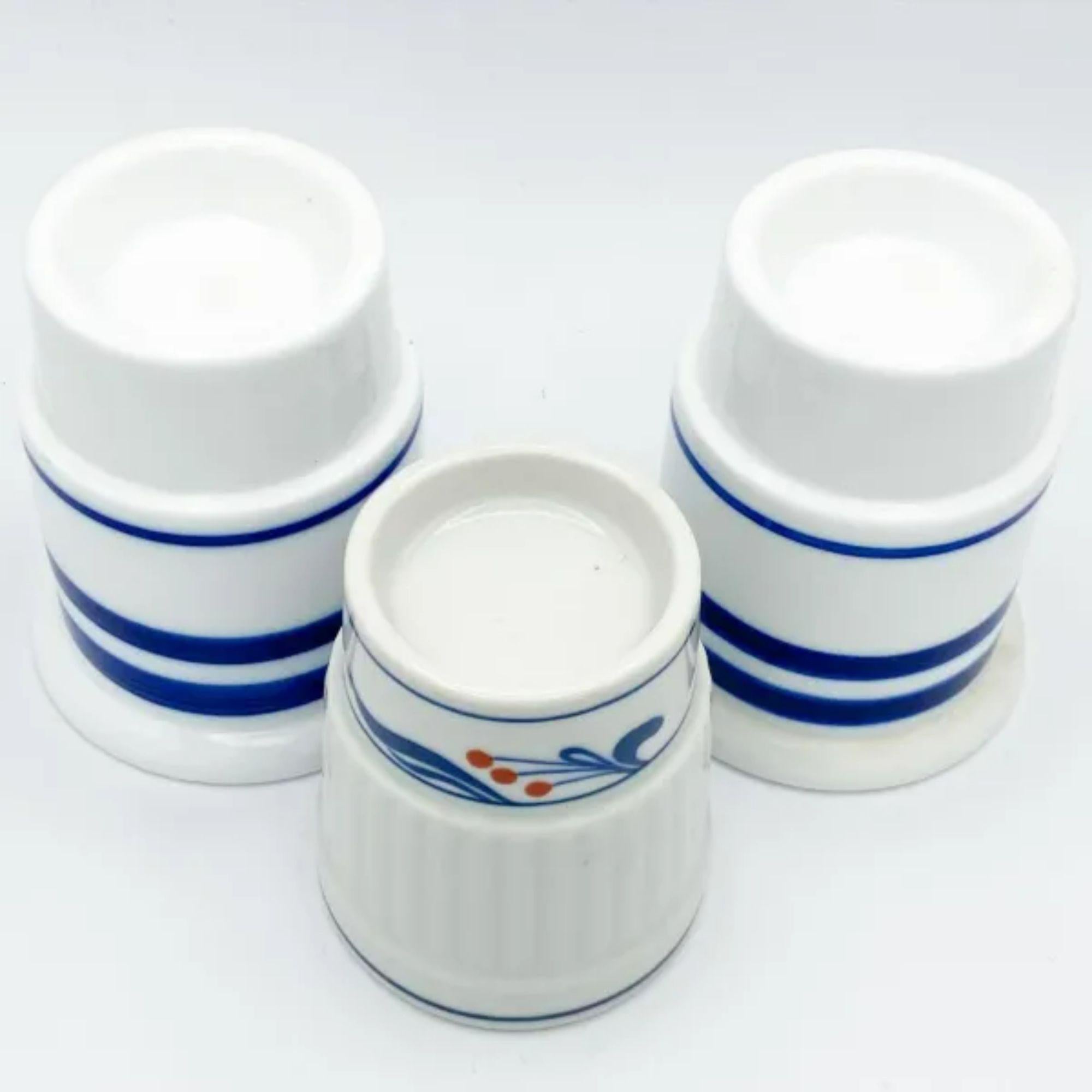 Elegant set of 3 porcelain candle holders by Dansk.

Additional information: 
Material: Porcelain
Color: White
Style: Mid-Century Modern
Brand: Dansk
Time Period: 1960s
Place of origin: Japan
Dimension:
Large: 3.25