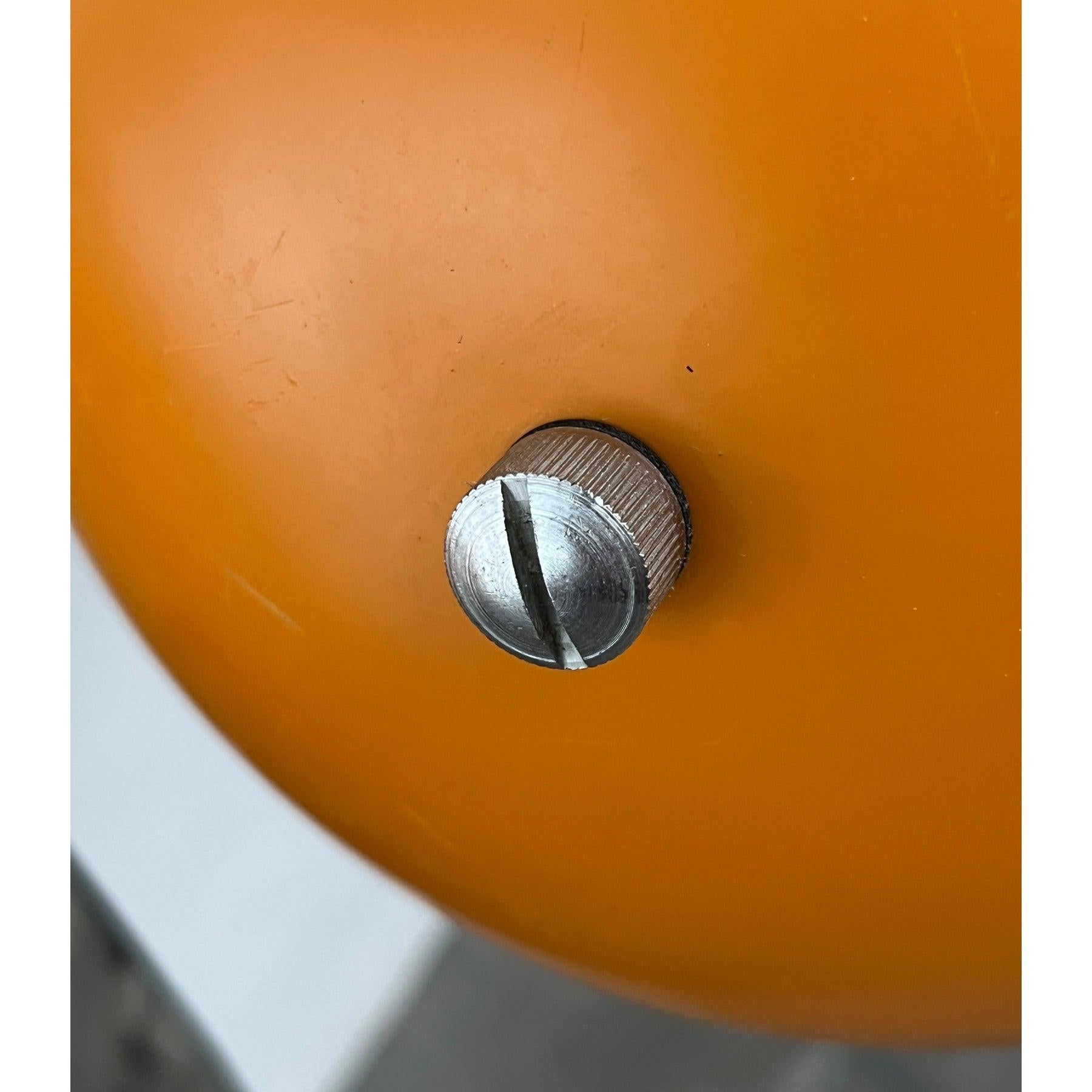 Space age sphere wall lights from the danish manufacturer louis poulsen. Here in a special color.

 a timeless design. The spherical lamp head with the original color in a matt yellow tone is striking. The head sits at the end of a short bar that