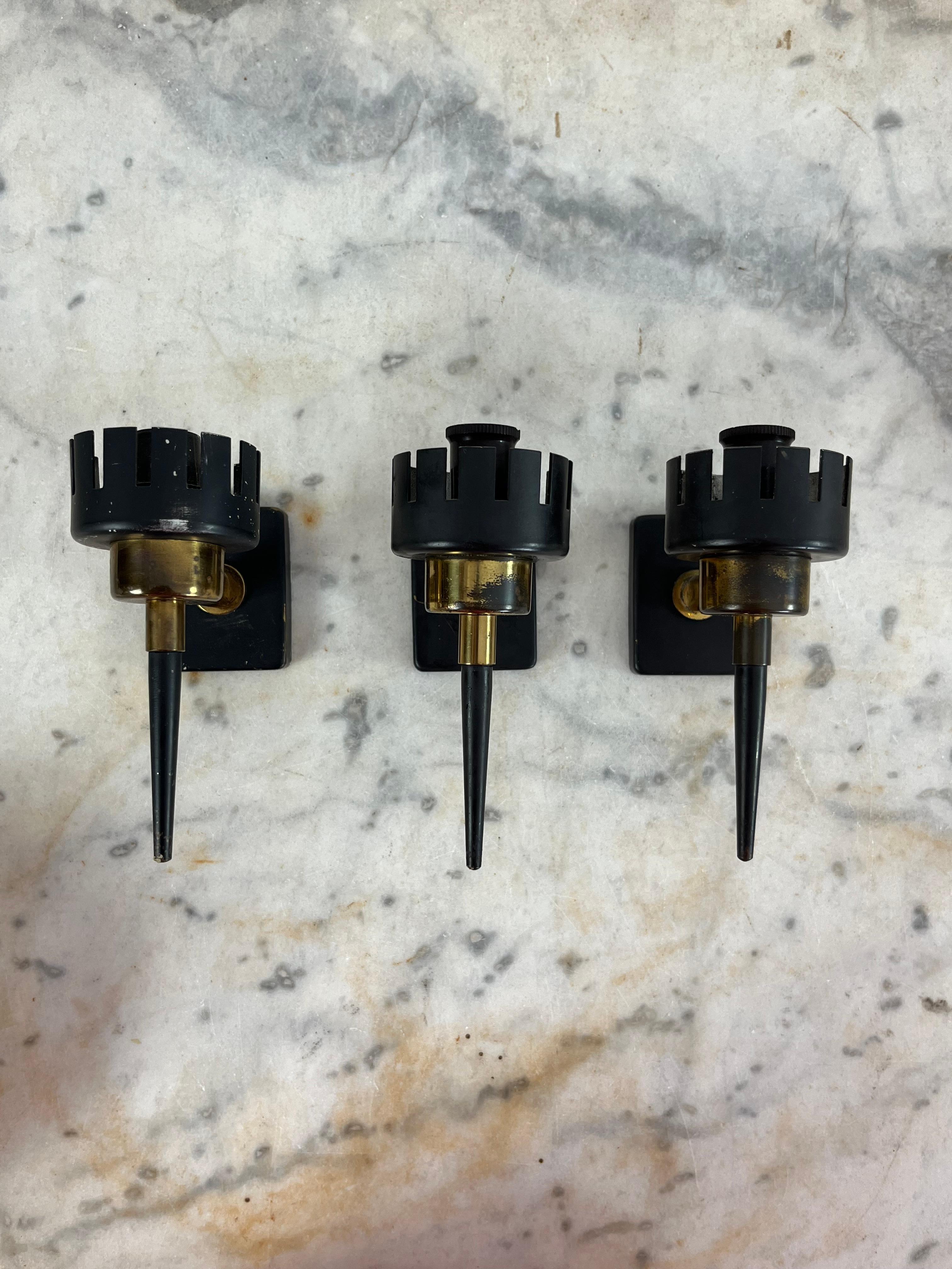 Set of 3 Mid-Century Stilnovo wall lamps, 1950s
Brass and metal structure, opaline glass bowls. 
E14 lamps.
Glass intact, good condition.

We guarantee immediate shipping with adequate packaging and DHL courier.