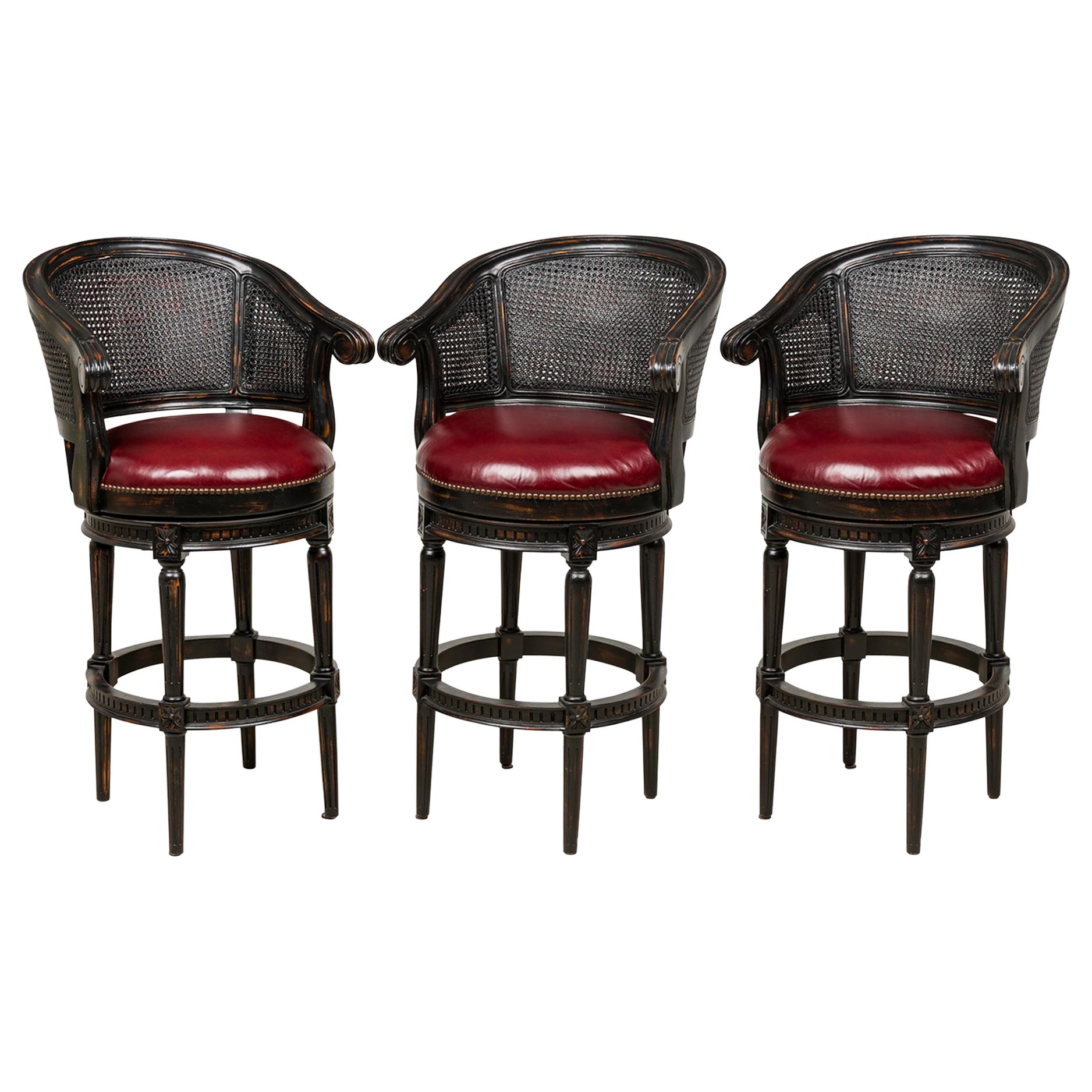 Set of 3 Mid-Century Wood 
Cane Horseshoe Back Swivel Stools with Leather Seats For Sale