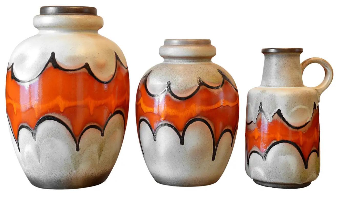 Set of 3 midcentury vintage ceramic floor vases, Germany, late 1960s. A batman pattern very sought after. Some can be mounted as a lamp as it was sometimes the case in this period (see last photo). Dimensions from left to right - height 51cm - 20