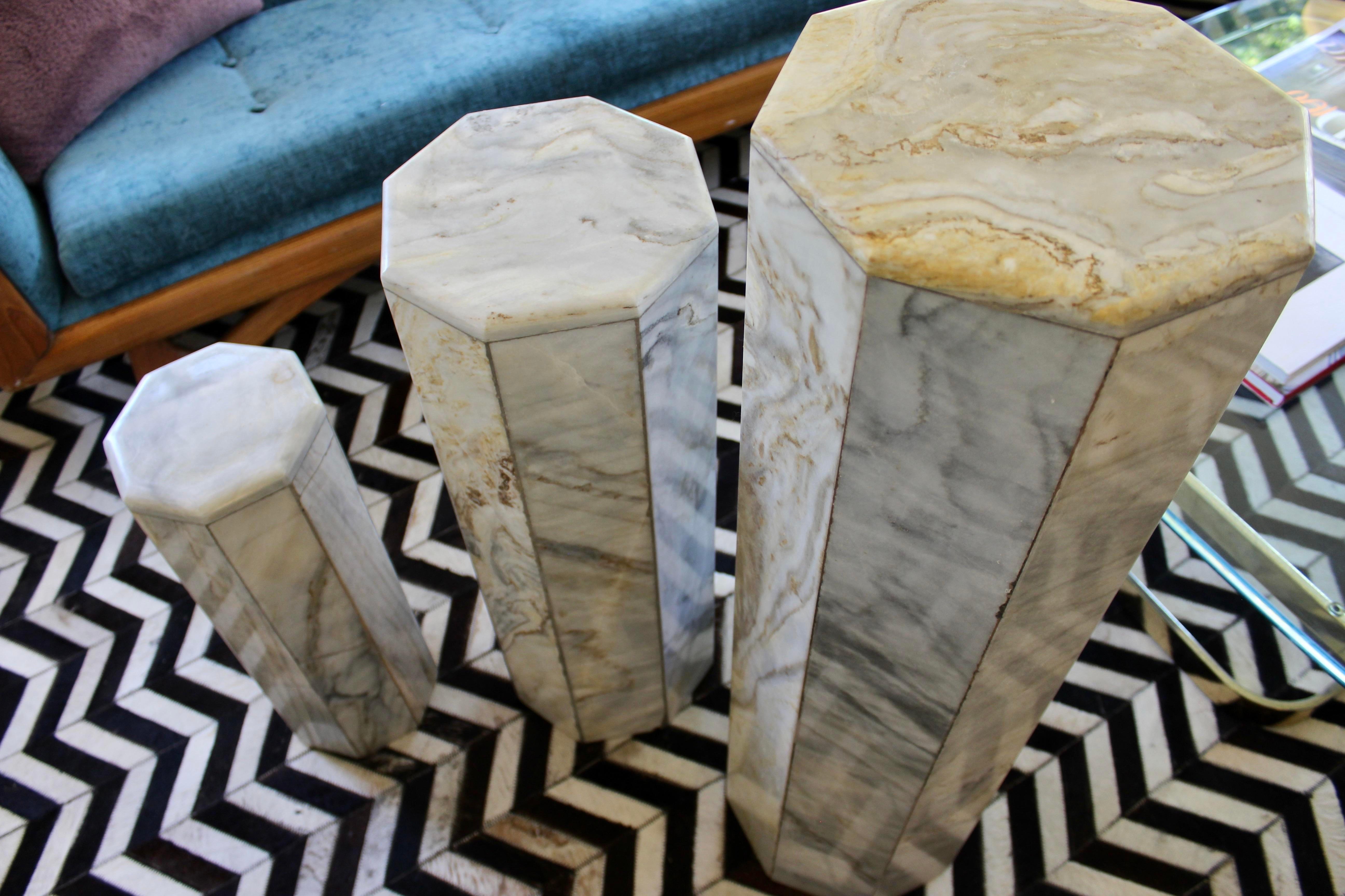 Set of 3 Italian marble hexagonal pedestals from the 1970s. This stylish three piece set of Italian Picasso marble pedestals will make a statement as a group and can be used individually. All edges flow smoothly into the next. The color is Picasso