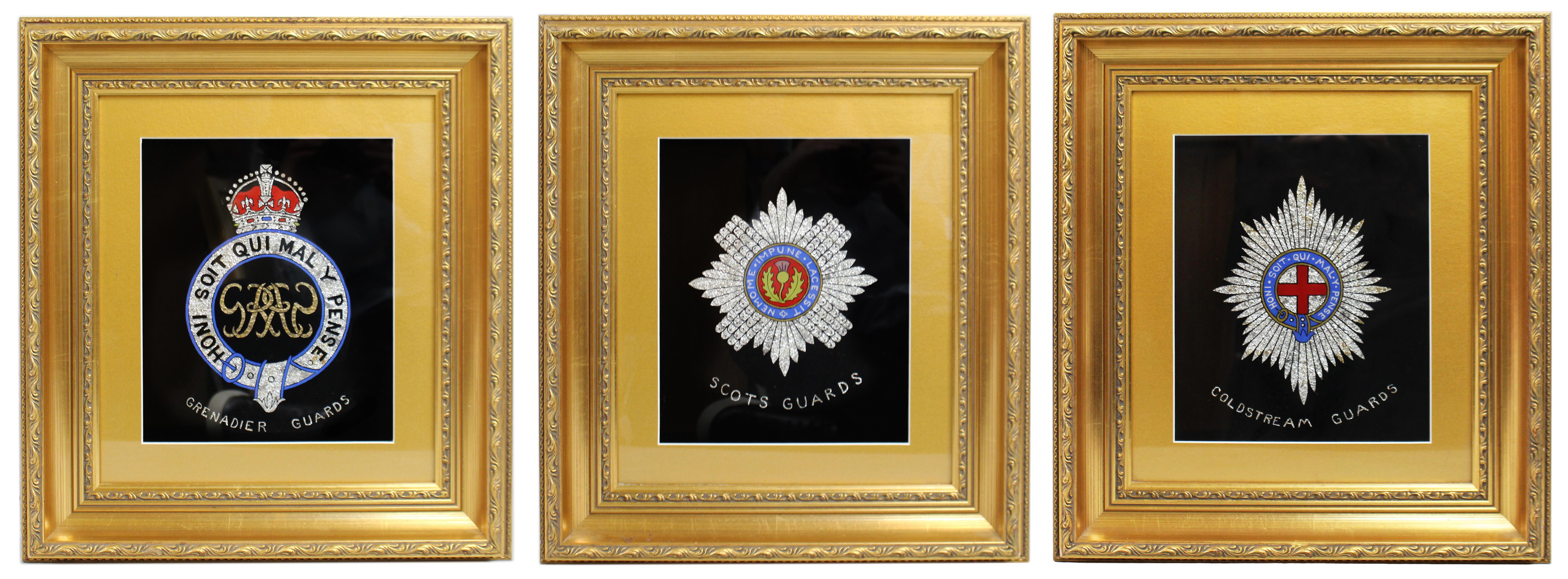 Set of 3 British Regimental Foil Artworks in Giltwood Frames, Mid-20th Century

Offered for sale is a fine set of three framed foil artworks depicting the insignia of distinguished British Army regiments: the Grenadier Guards, Scots Guards, and