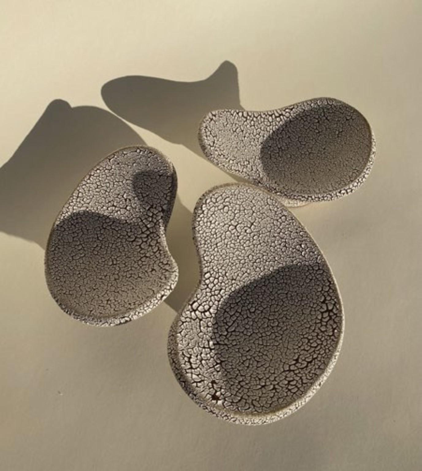 Set of 3 Mini bowls by Olivia Cognet
Materials: Clay
Dimensions: around L :16 cm l: 16 cm H: 10 cm

Each of Olivia’s handmade creations is a unique work of art, the snapshot of a precious moment captured in a world of fast ‘everything’.
Since