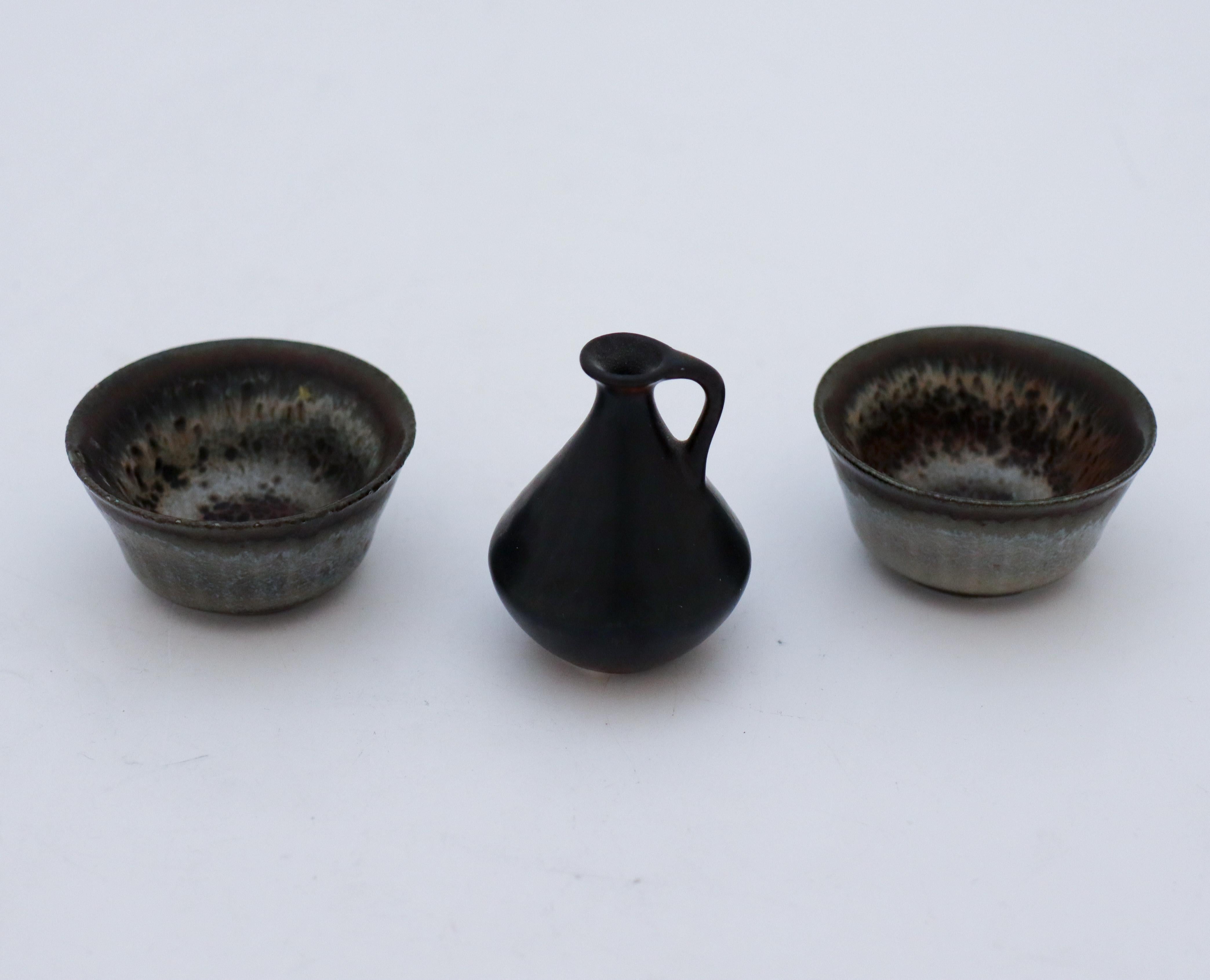 A set of 3 miniatures designed by Carl-Harry Stålhane at Rörstrand, the vase is about 5 cm in diameter and 5 cm high and the bowls are about 5 cm in diameter. They are all in excellent condition and marked as 1st quality. 

Carl-Harry Stålhane is