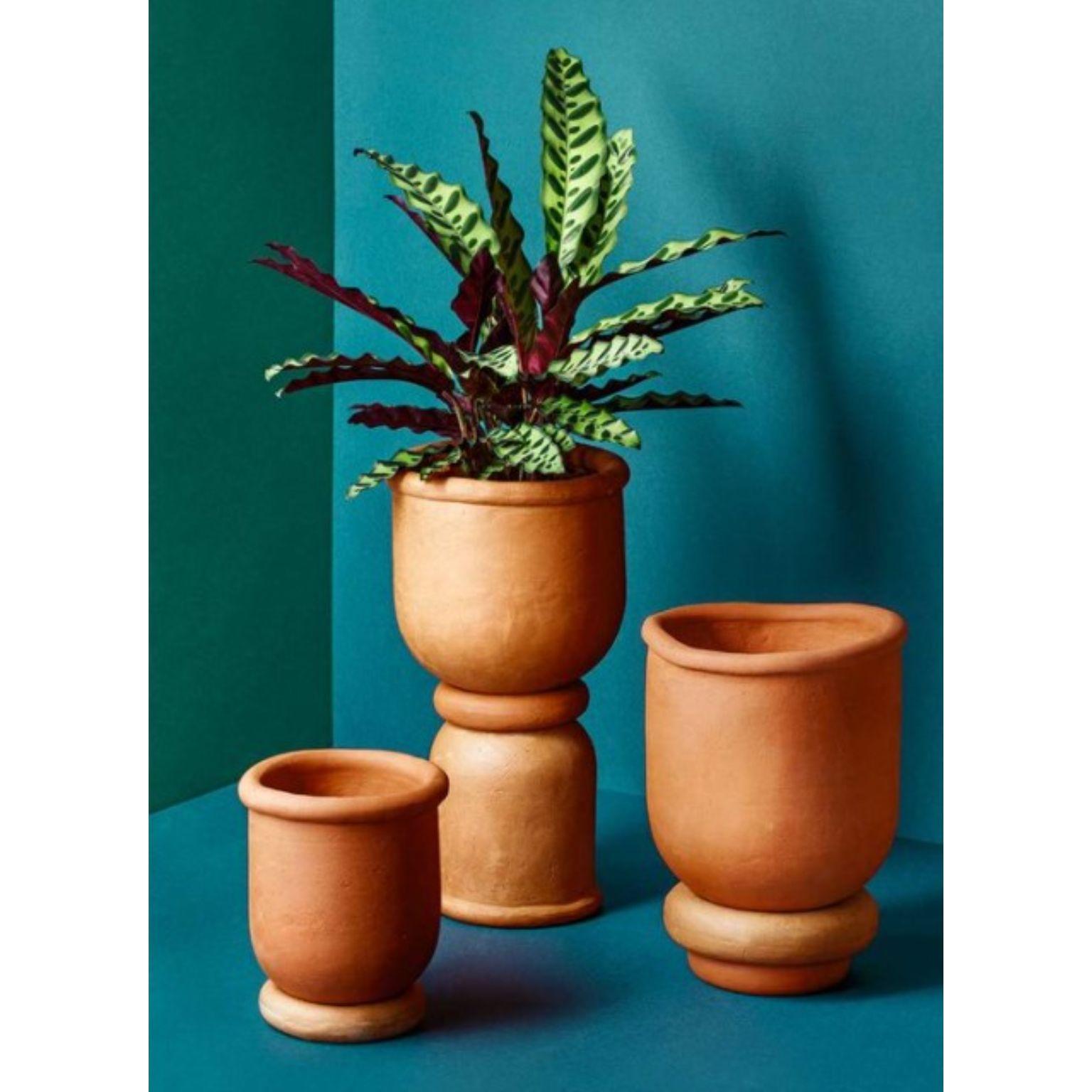Set of 3 Mix & Match Vases by Tero Kuitunen
Material: Handbuild terracotta.
Dimensions: D22 x H40 cm, D25 x H25, D17 x H22
Also available : Two different size that can be compiled in many ways.

Handbuild terracotta planters. Open