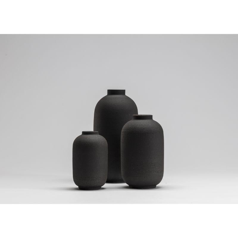 Set of 3 Mn vases by Josefina Munoz
Mn collection
Dimensions:H12 X ?7,5, H18 X ?11, H25 X ?13,5cm
Material: ceramics (black sandstone and transparent enamel) 

Available in: soliflor, small, and medium

Ceramic handcrafted vases, glazed