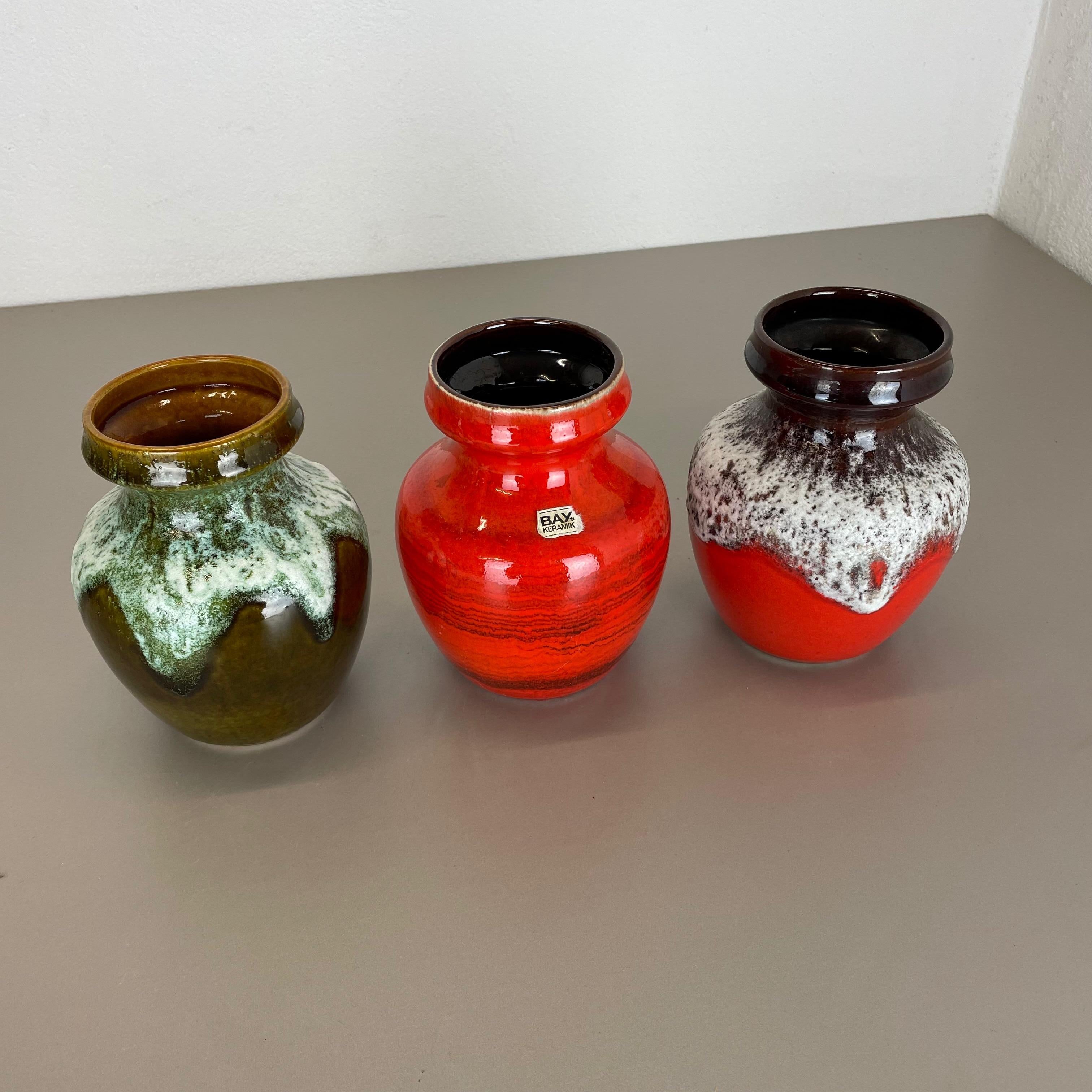 Mid-Century Modern Ensemble de 3 vases en poterie d'art optique lave grasse multicolore fabriqués en céramique de Bay, Allemagne en vente