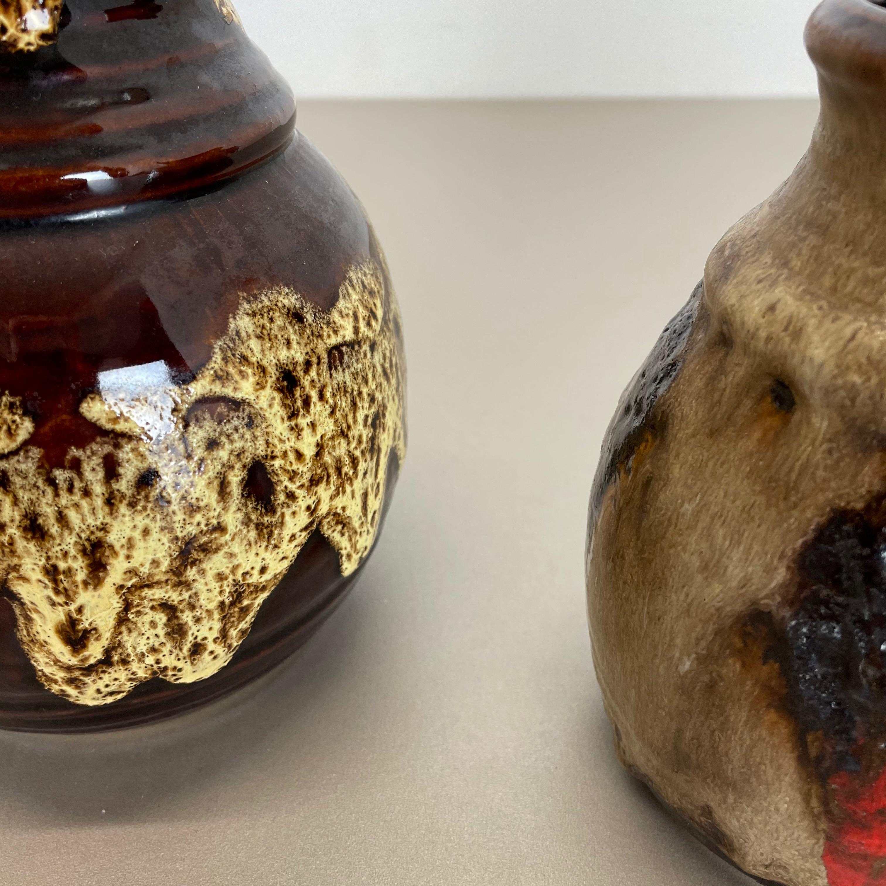 20ième siècle Ensemble de 3 vases en poterie d'art optique lave grasse multicolore fabriqués en céramique de Bay, Allemagne en vente