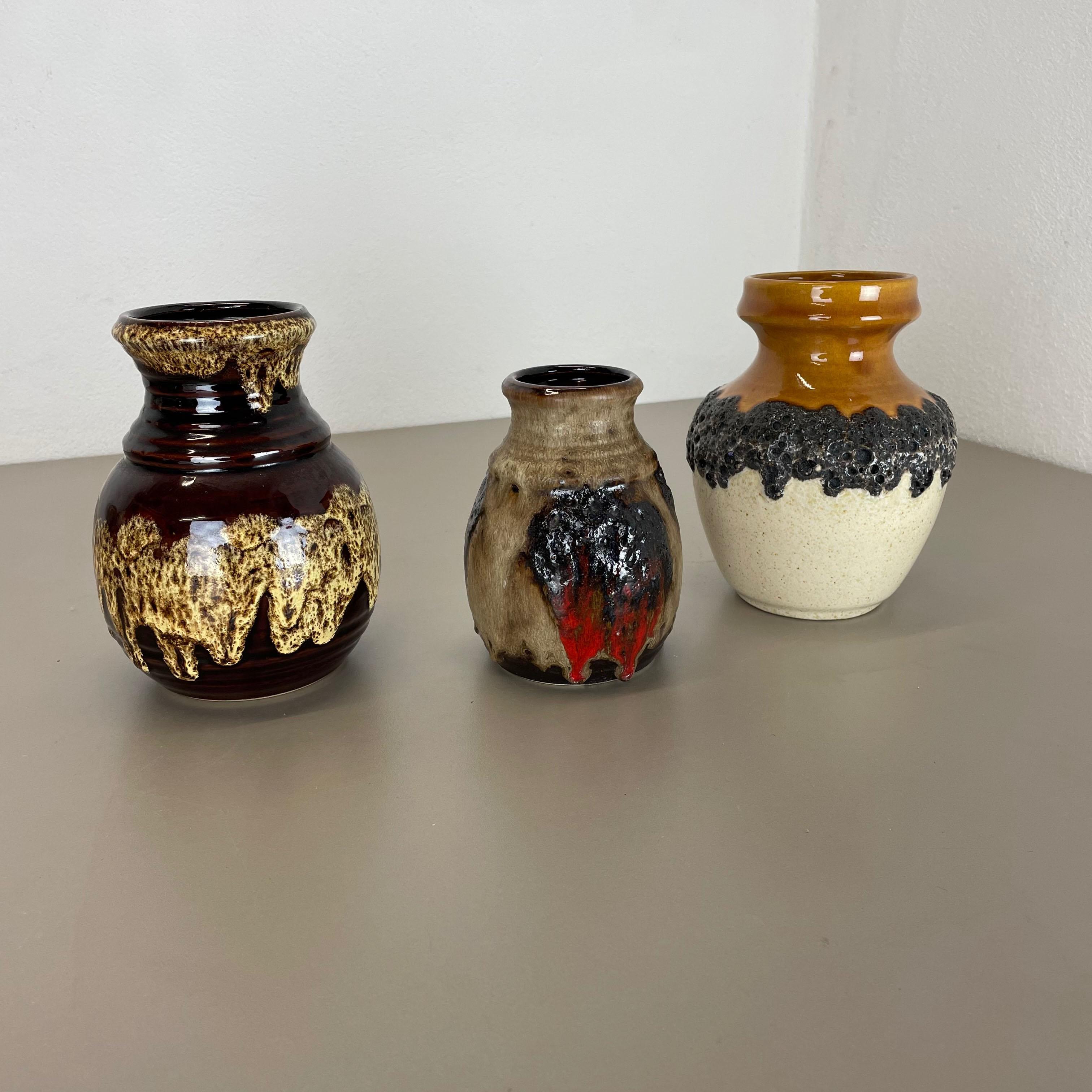 Céramique Ensemble de 3 vases en poterie d'art optique lave grasse multicolore fabriqués en céramique de Bay, Allemagne en vente
