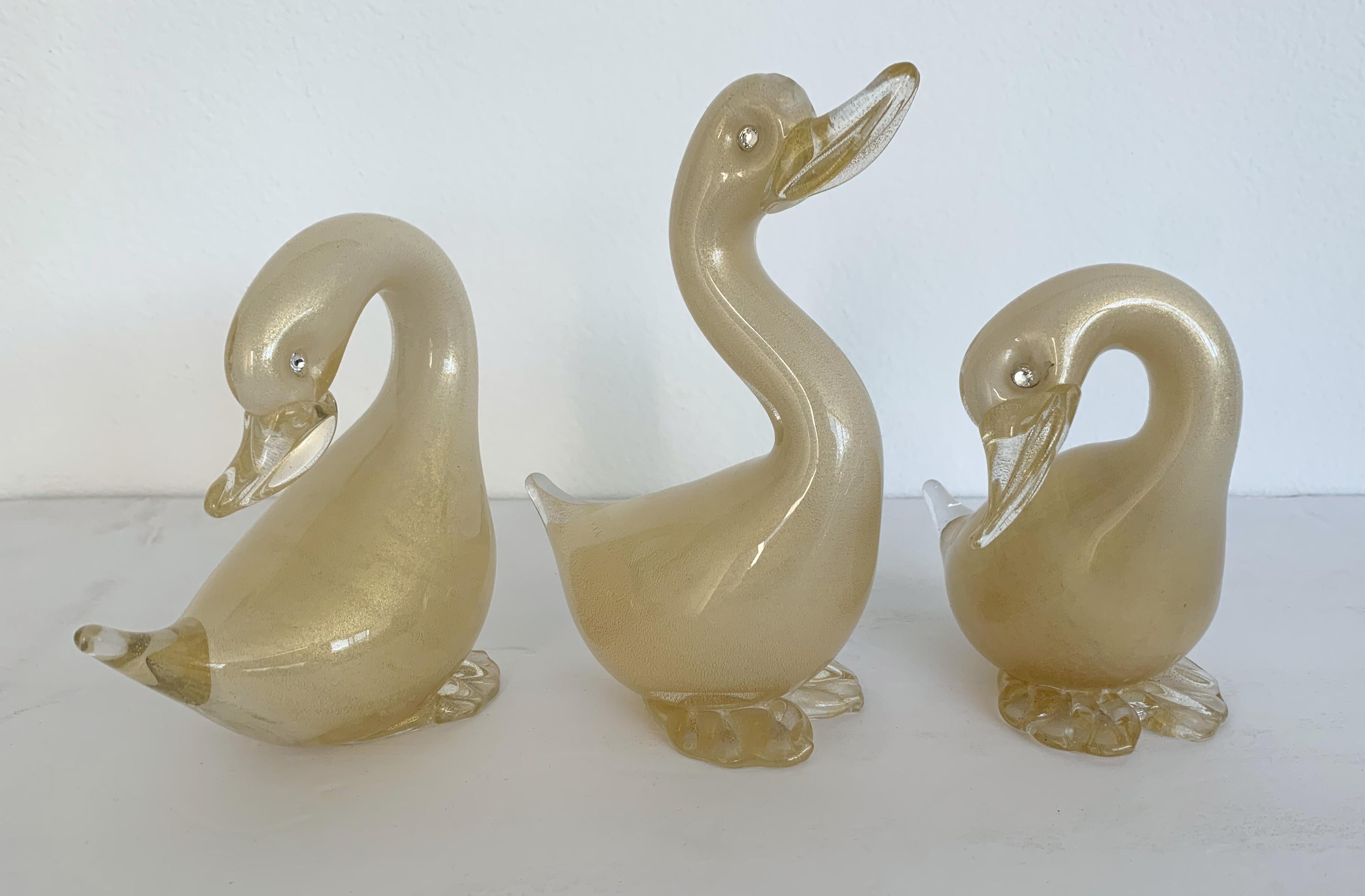 Set of 3 vintage hand blown Murano glass ducks infused with gold flecks, with Swarovski crystal eyes / Made in Italy, circa 1980s

