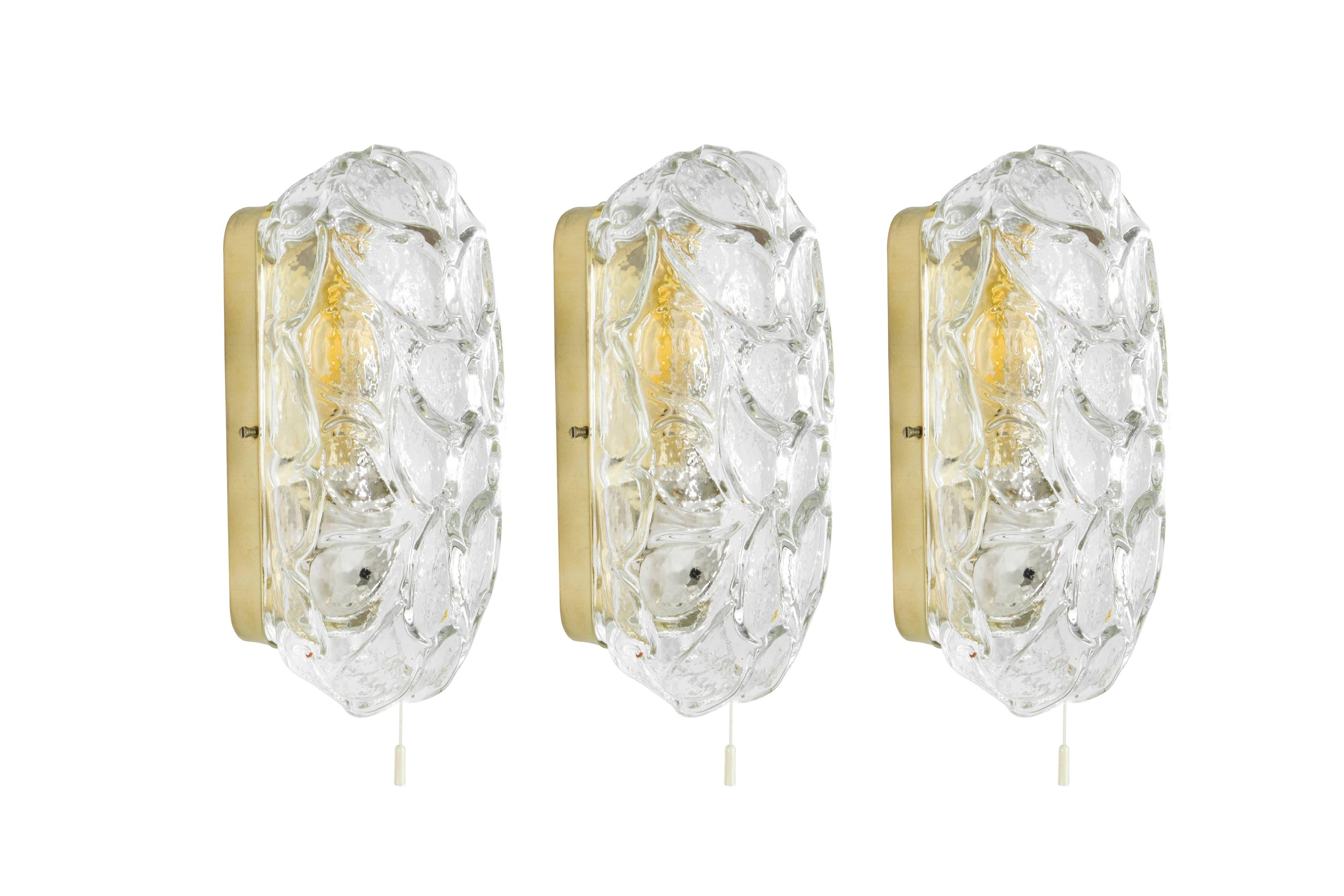 Beautiful and rare set of three bubble glass sconces original from Austria, circa 1960s.

Fully rewired.