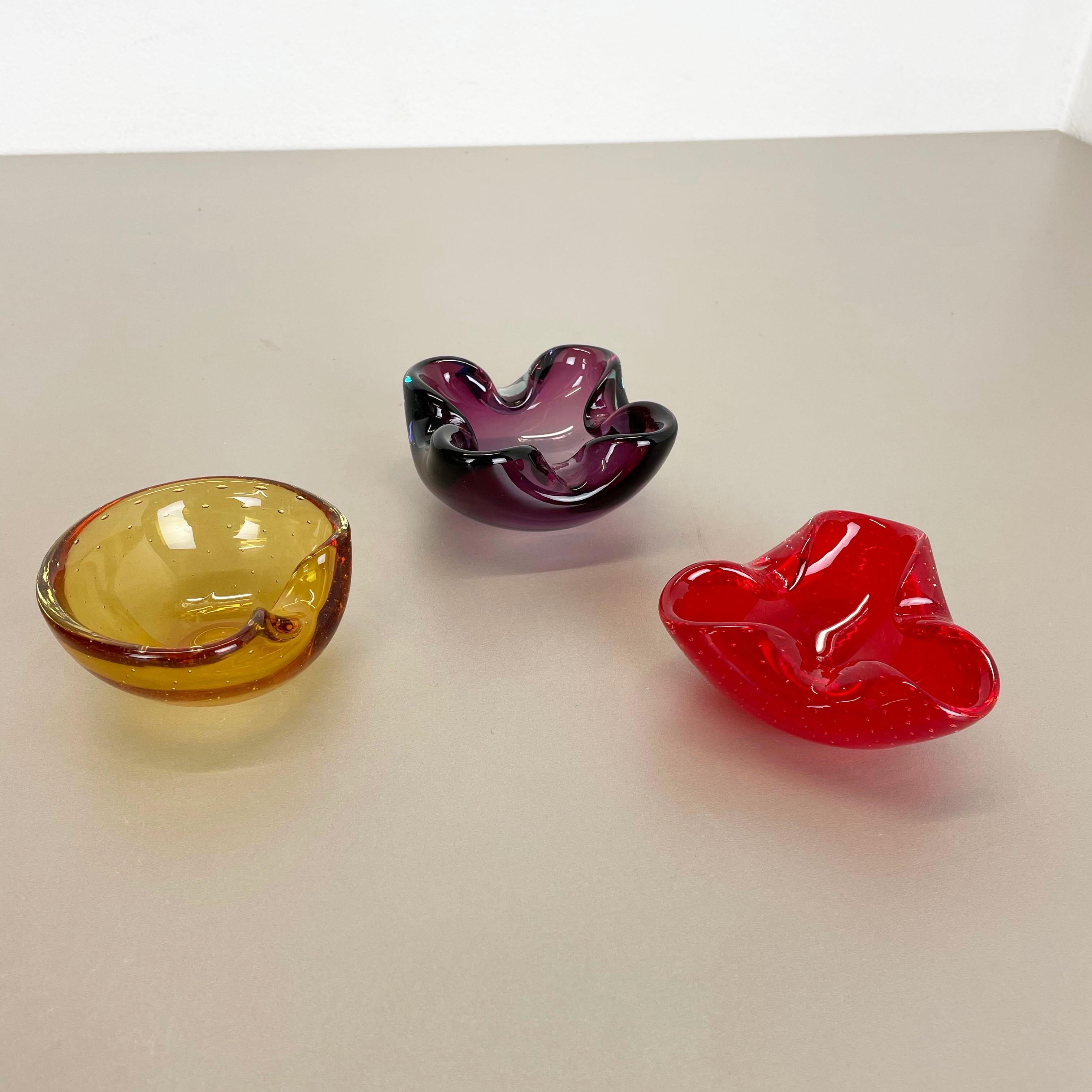 Article:

Murano glass bowl elements, set of 3


Origin:

Murano, Italy


Decade:

1970s


This original vintage glass elements were designed and produced in the 1970s in Murano, Italy. they are made in special murano production