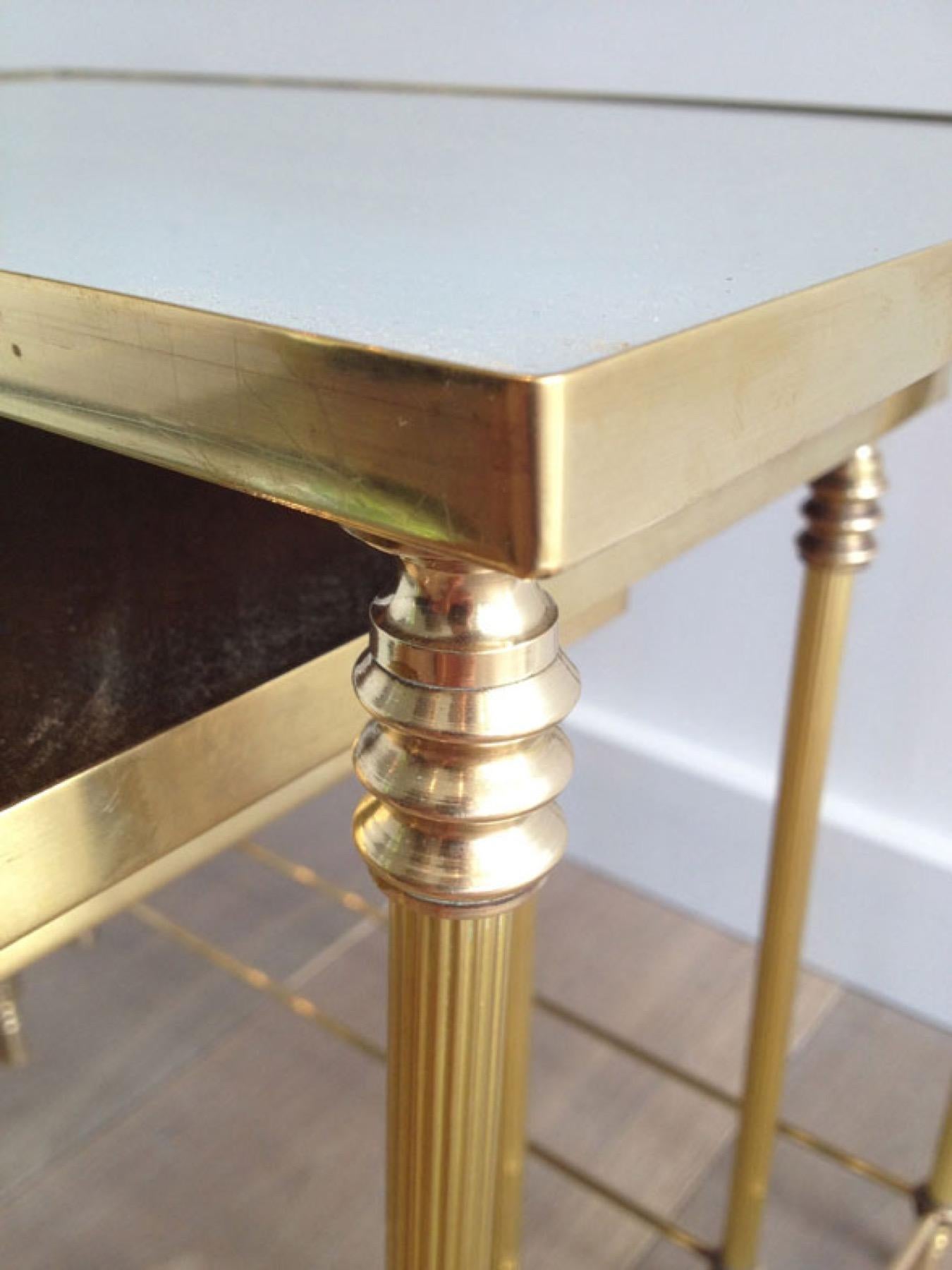 Mid-20th Century Set of 3 Neoclassical Style Brass Nesting Tables with Mirror Tops, French Work For Sale