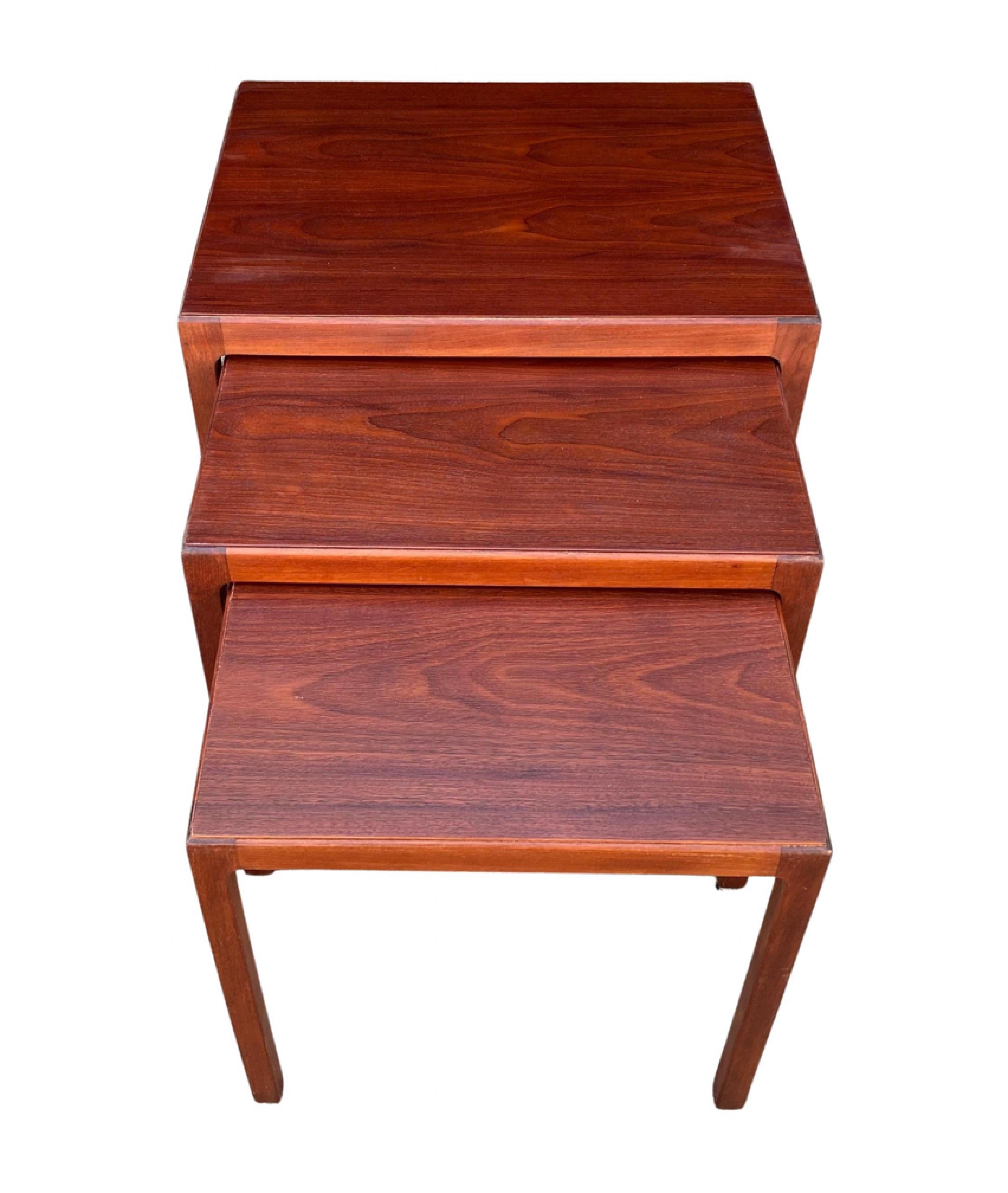 Very elegant set of nesting tables in beautiful mahogany. 

Danish midcentury. In the style of Hans J. Wegner and Johannes Andersen.

Excellent condition.