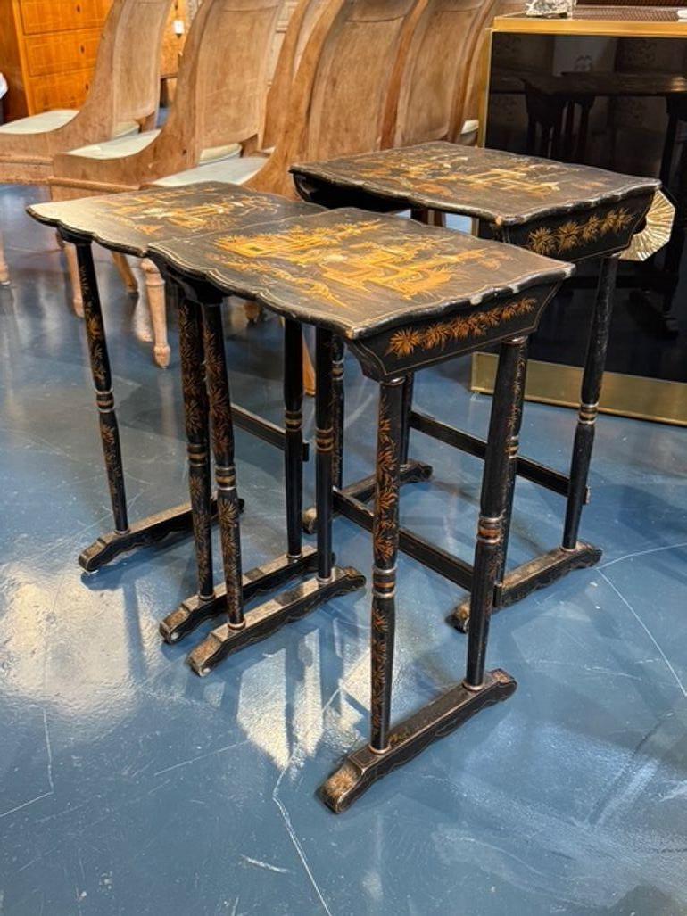 Lovely set of 3 nesting tables with Chinoiserie design.  Featuring a beautiful intricate hand painted design with mother of pearl.  So pretty!  Circa 1880
18w x 13.5d x 26h